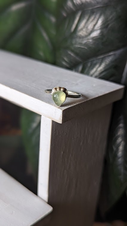 green gemstone ring
