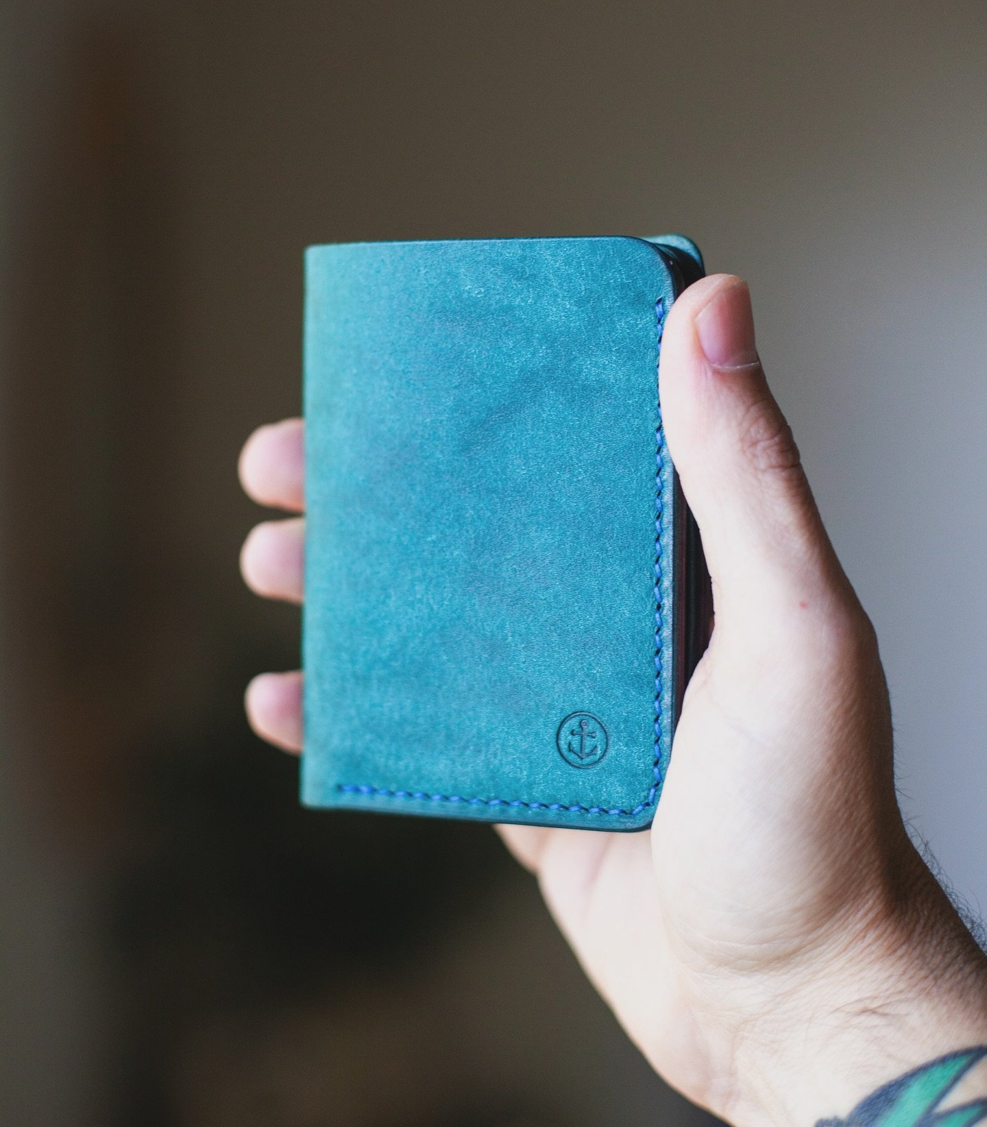 Custom color combo from the coastline custom shop. Blue and purple with sapphire stitch. I absolutely LOVE this color combo. 

#wallet #leathercraft #vegtan #fullgrainleather #leatherwallet #madeintheusa #coastlineleathergoods