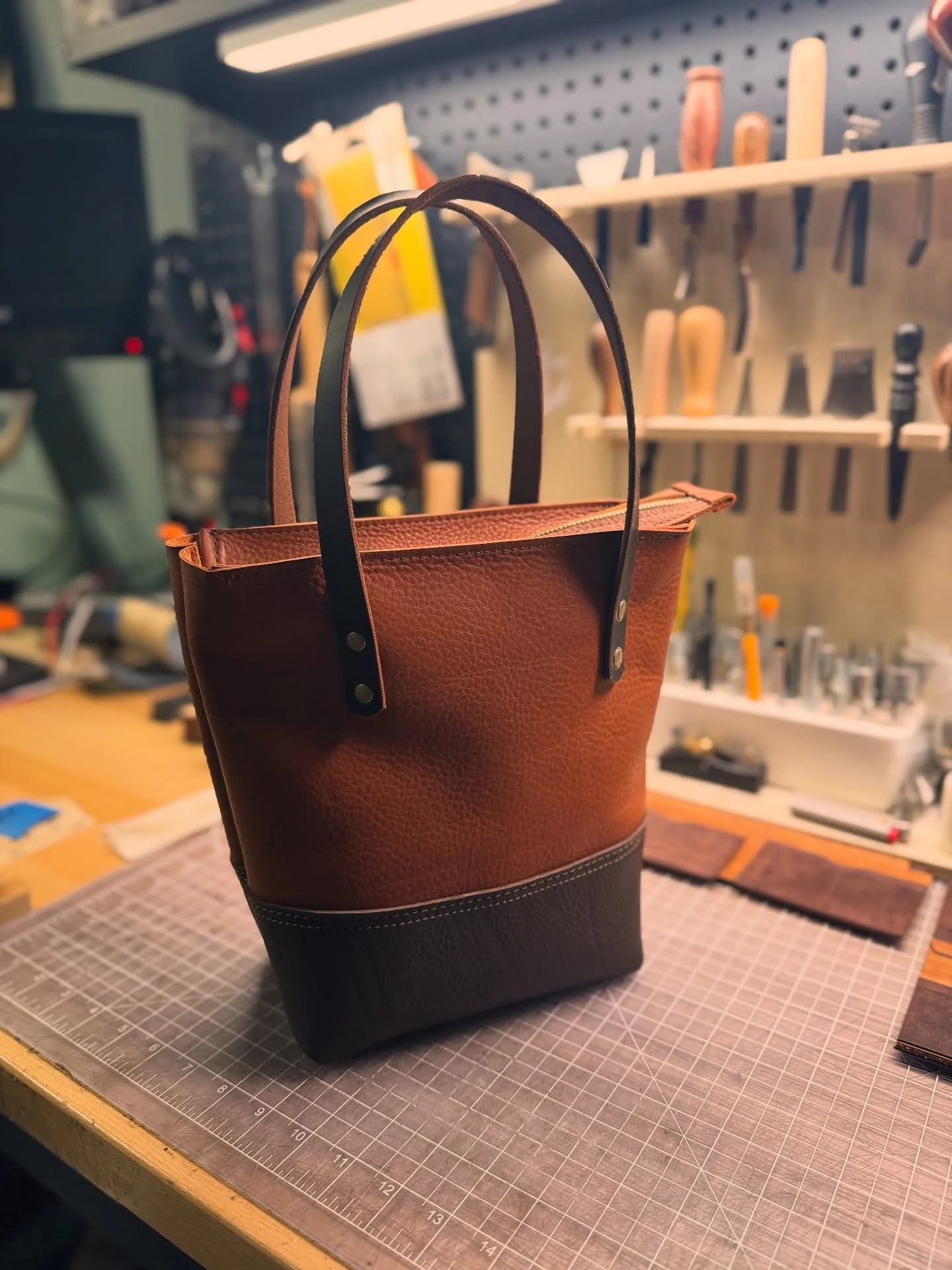 Getting closer. Made some zipper improvements. Waiting for my new brass stamp to come in so the next one will be branded. 

#leathertote #totebag #prototype #creative #journey #leathercraft #vegtan #fullgrain