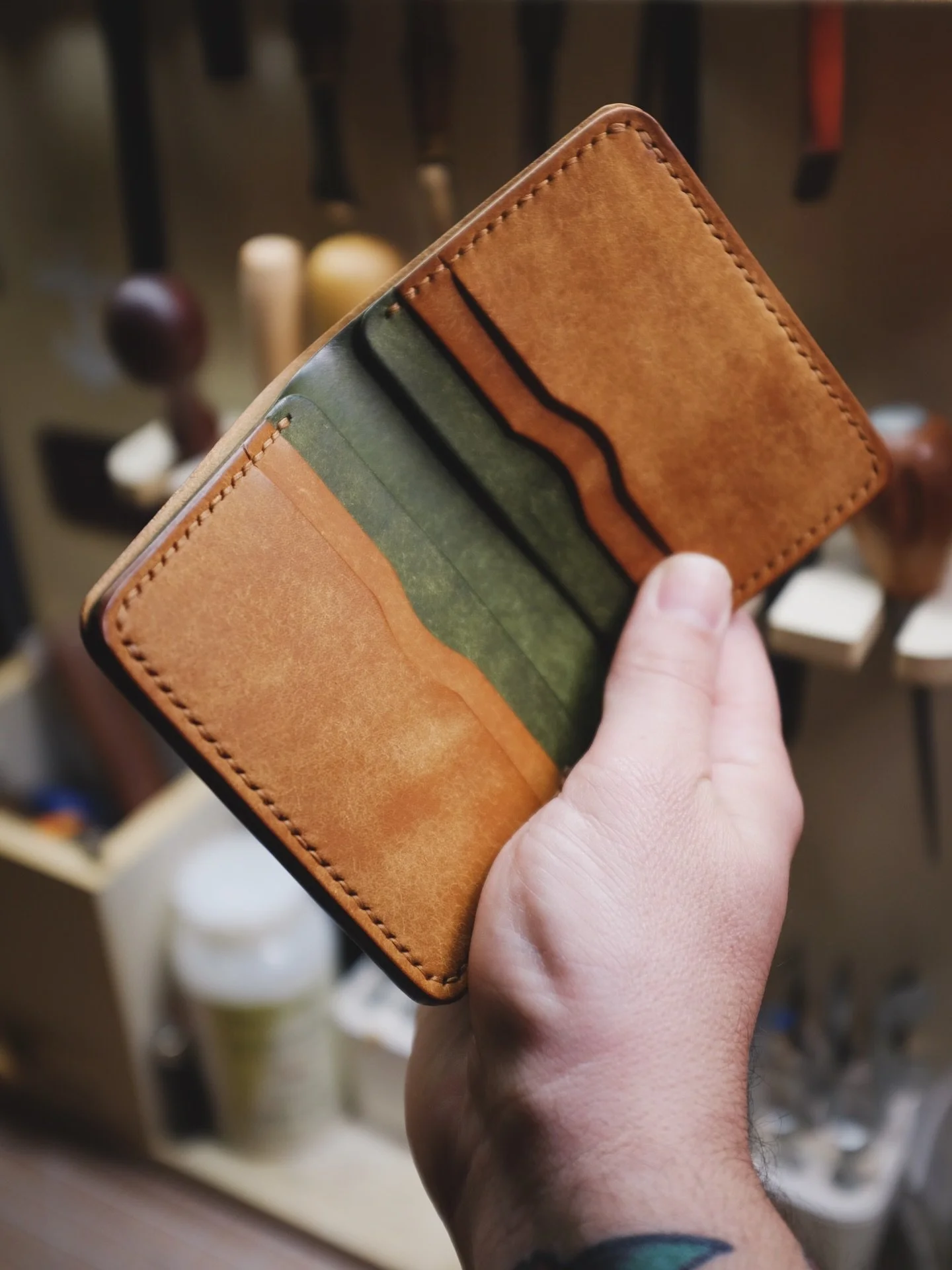Freshly made Vertical Bifold V2 in cognac and green. Made with Italian Pueblo leather. A full-grain, veg-tan cowhide leather from Italy. 

#leathercraft #leatherwallet #buyitforlife #bifoldwallet #madeintheusa