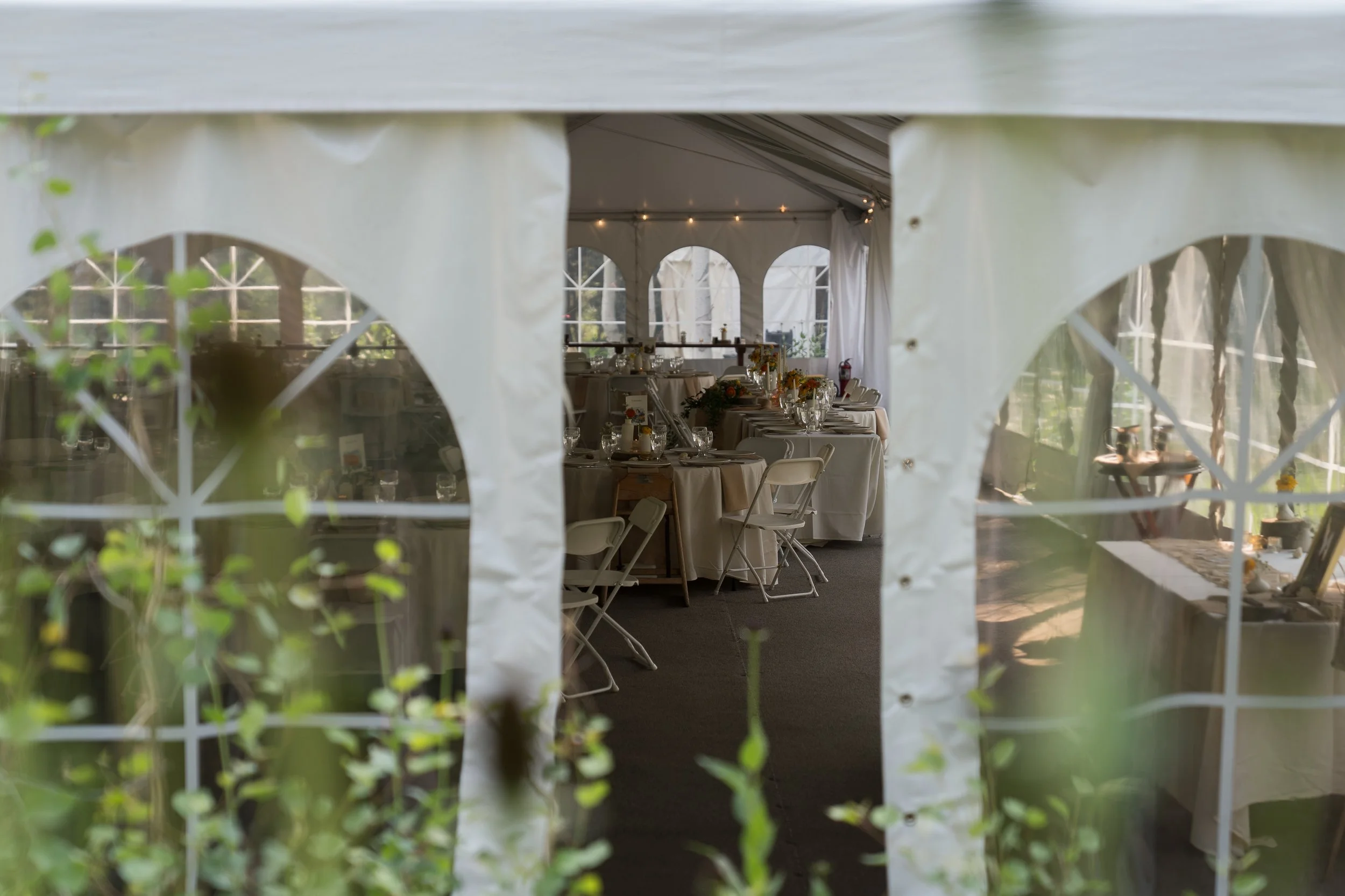 Grand Targhee Resort, documentary Wedding photography; tent with tables set up for reception