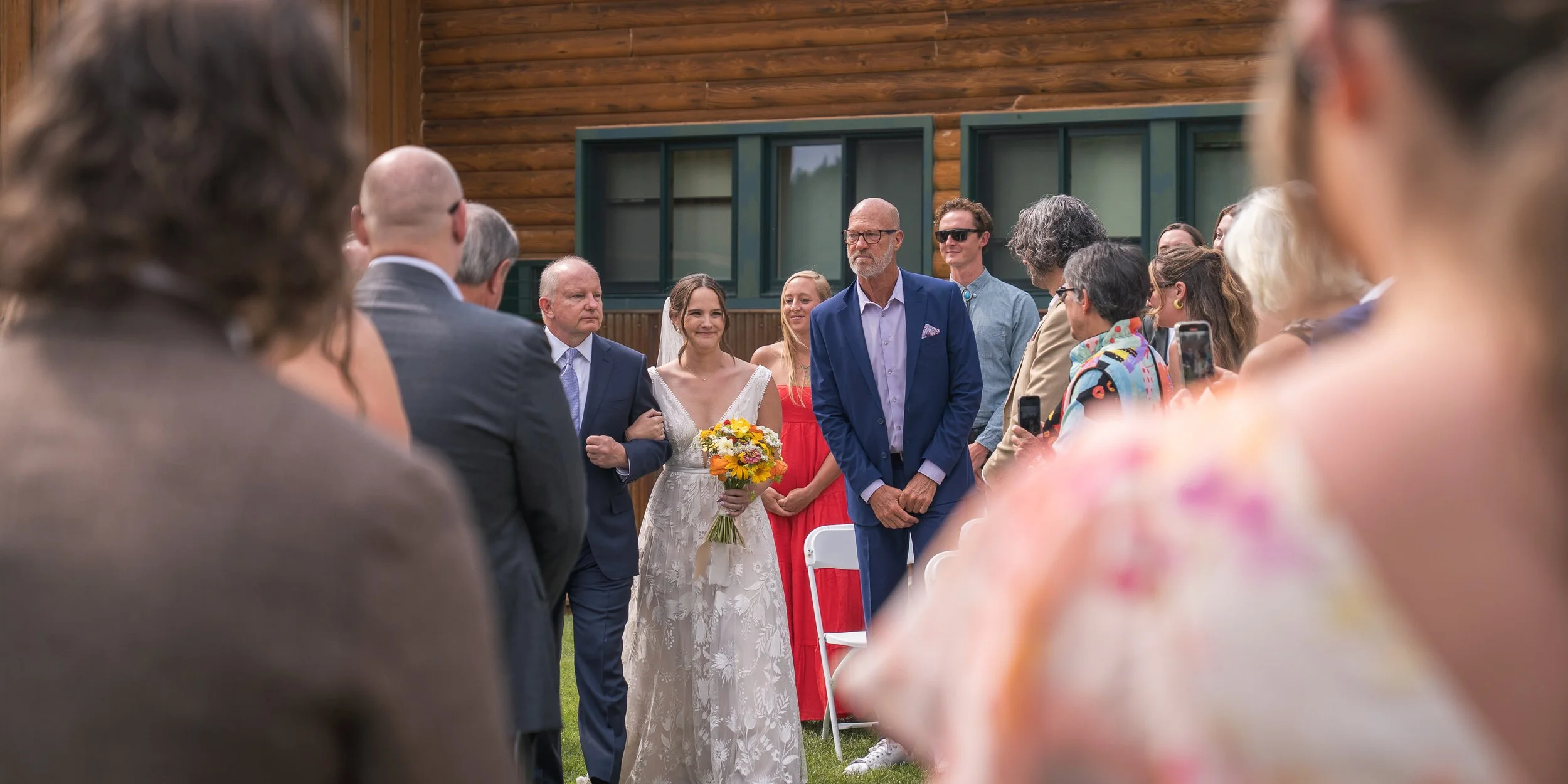Grand Targhee Resort, documentary Wedding photography; bride walking down aisle with her father