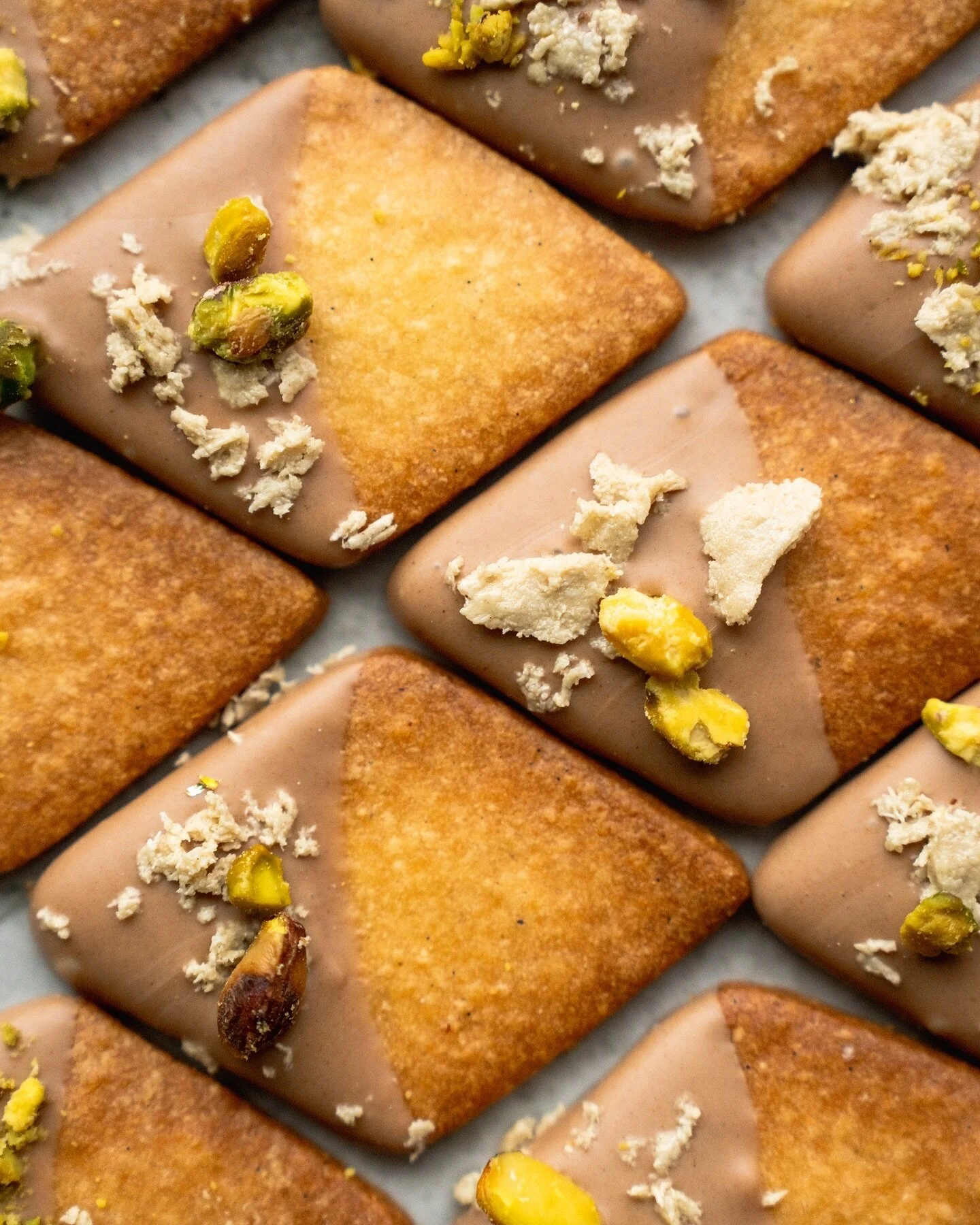 Buttery, nutty, and crisp ~ the Halva Sabl&eacute;s are the third and final cookie in this year&rsquo;s holiday collection. Almond sabl&eacute;s are dipped in almond chocolate and topped with nutty halva. Available exclusively as part of this year&rs