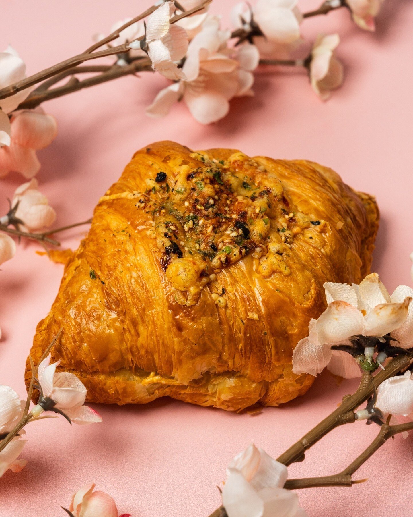 Our Hanami Collection is in full bloom ~ Cheese Ramen Croissant⁠ with ramen noodles, creamy bechamel, butter shoyu corn, gruyere and cheddar.⁠
⁠
#yvreats #vancouverfoodie #dishedvan #hanami #croissant