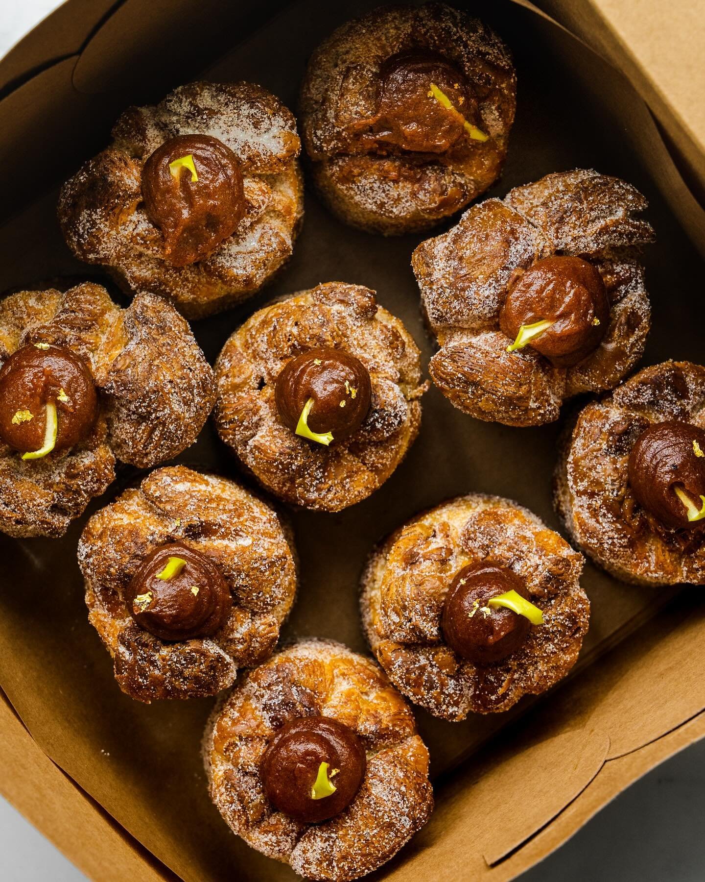 Apple of our eyes ~ apple pie bun with croissant dough rolled in cardamom sugar and topped with spiced apple compote.

#bakery #applepie #dishedvan #yvreats #vancouverfoodie