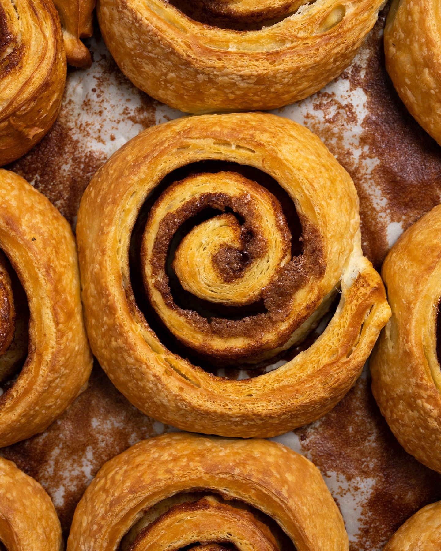 Layers of delicate croissant dough swirled with cinnamon, to be topped with a dusting of icing sugar.

#bakery #patisserie #dishedvan #yvreats #vancouverfoodie