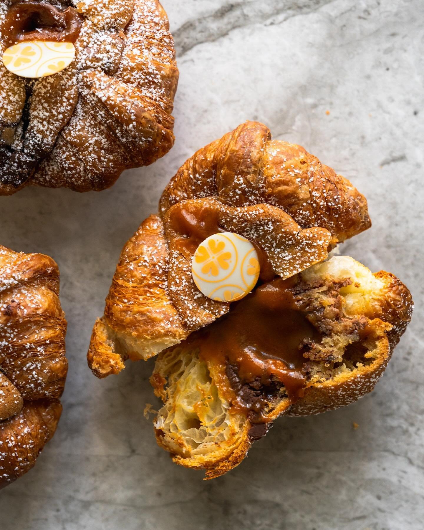 Banoffee Cookie Croissant ~ mini butter croissants, filled with our classic Valrhona chocolate chip cookie dough and a decadent salted banana caramel.

#bakery #dishedvan #yvreats #vancouverfoodie #cookiecroissant