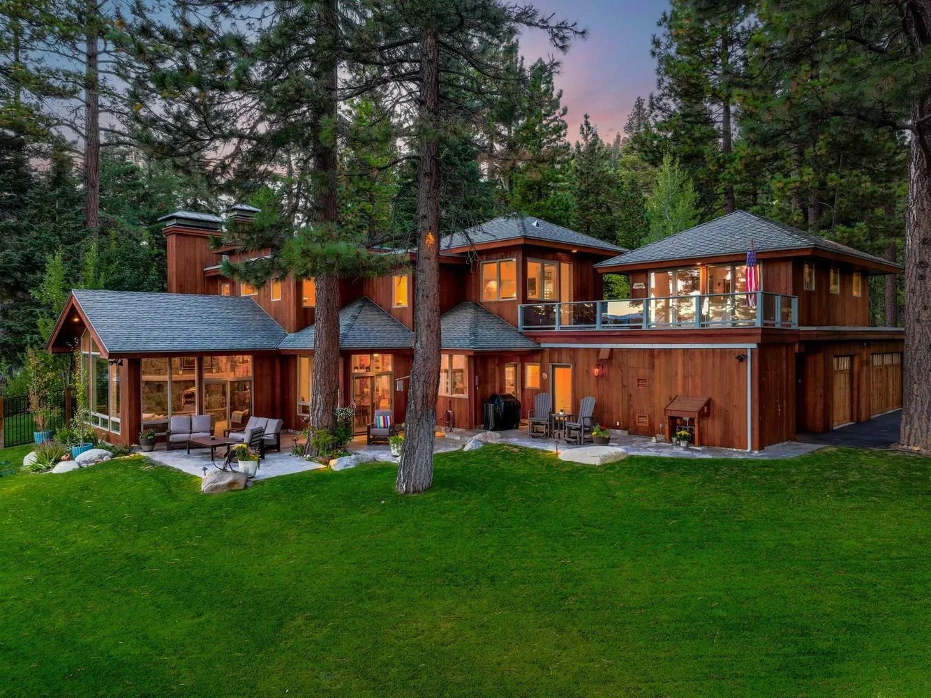 Exterior deck and wooded setting at 200 Rim Dr in Tahoe Vista, per the listing.