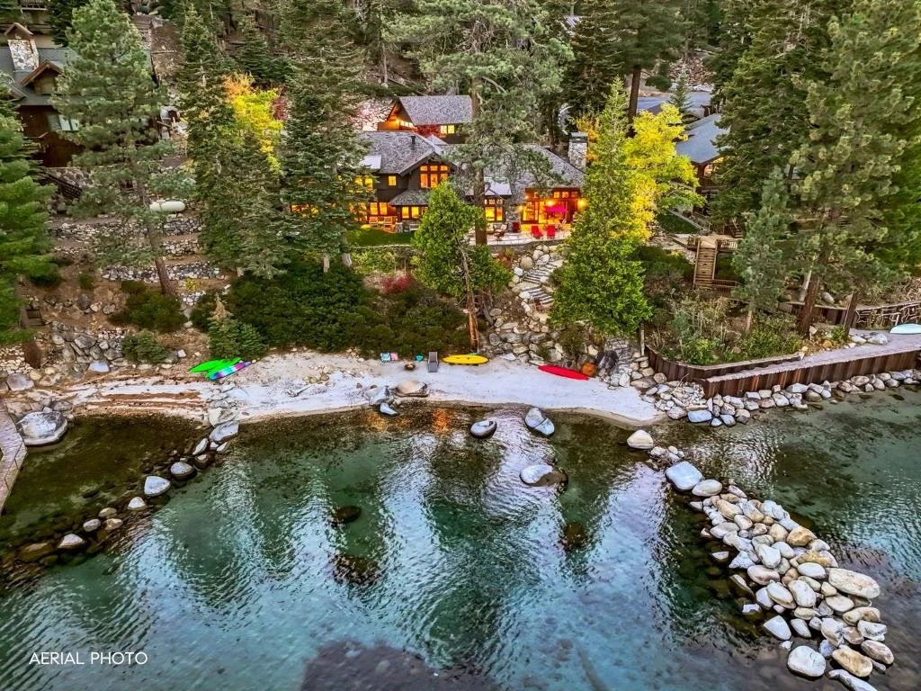 Aerial view of the cove and shoreline setting at 8747 Lakeside Dr in Rubicon Bay, per the listing.