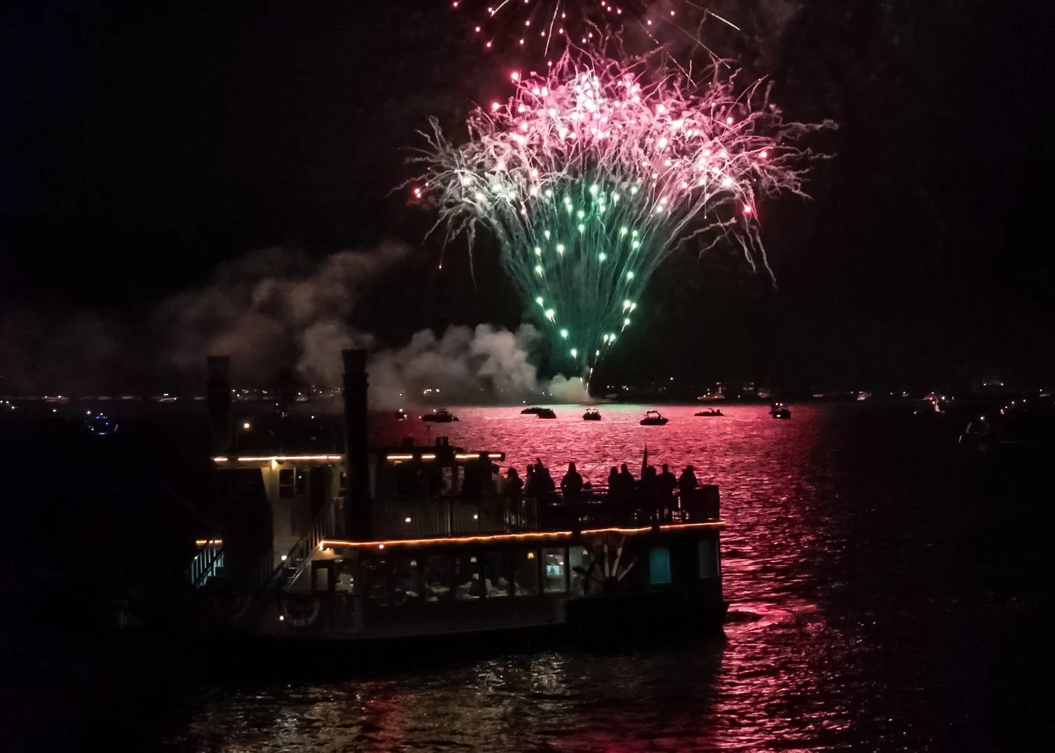 Crowd celebrating the Fourth of July in Tahoe City during the 2025 annual fireworks celebration at Commons Beach.