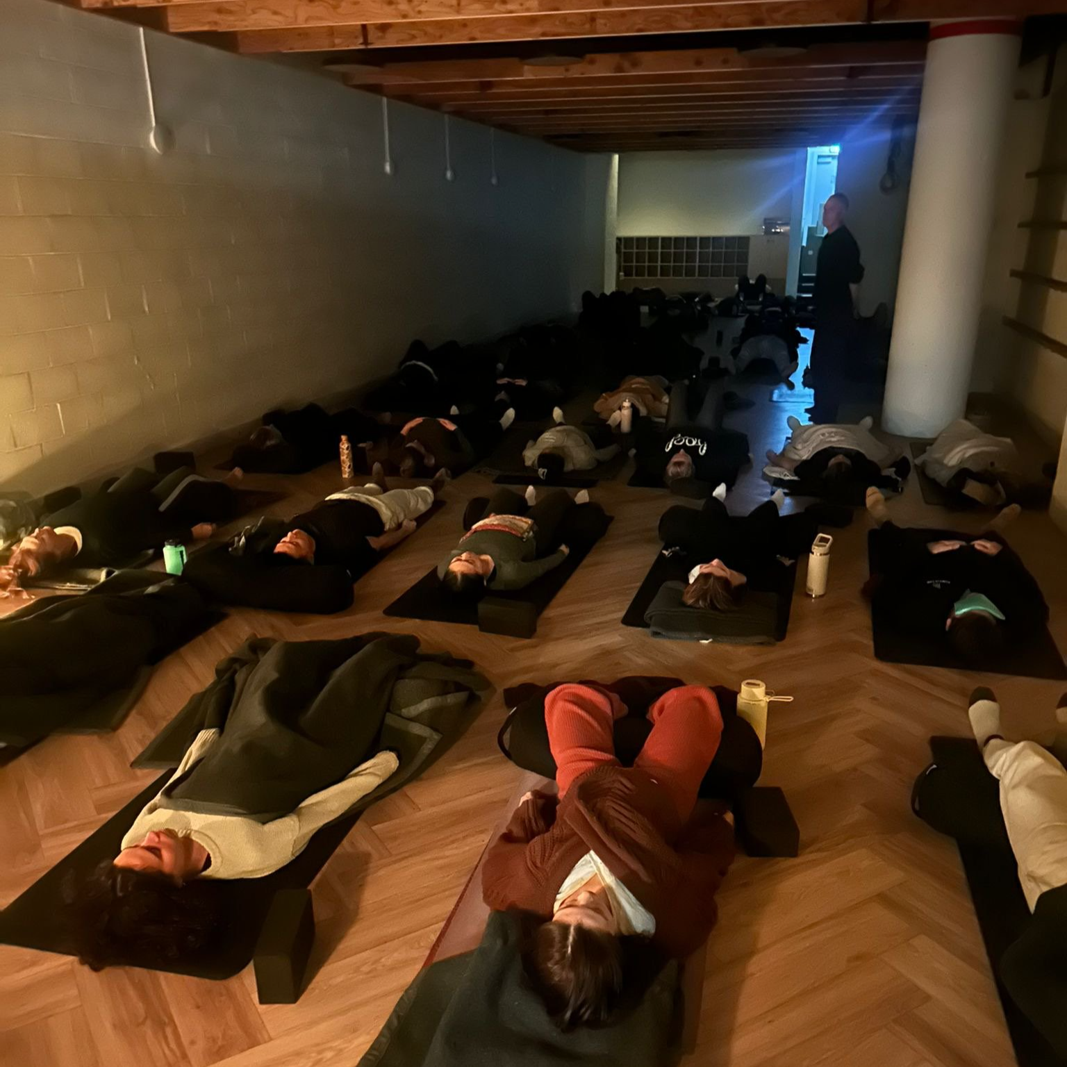 Students attending introductory academic wellbeing session with guided breathwork