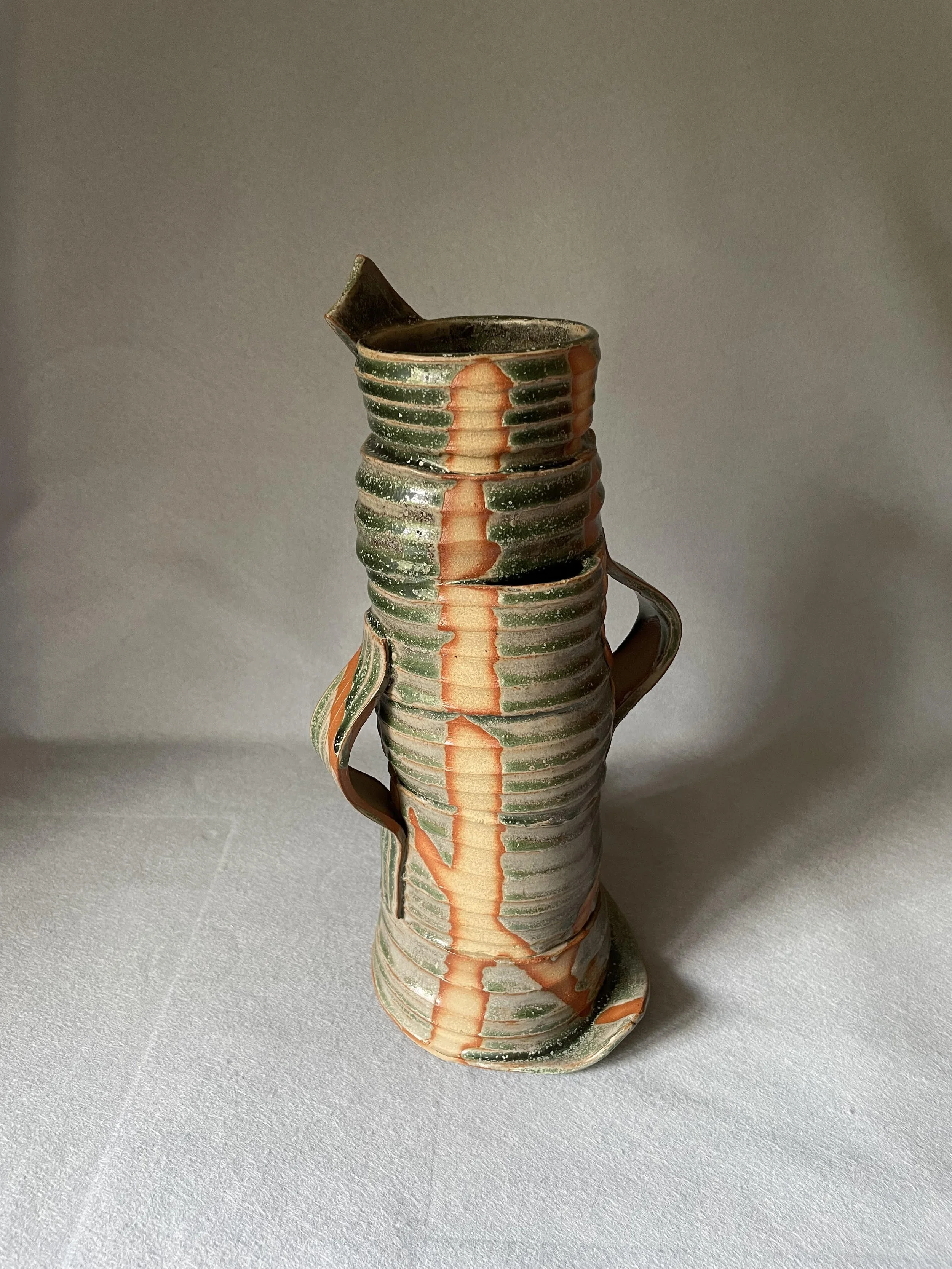 Ken	Kikkawa "United Vase"

Clay and glaze stoneware fired

33cm x	18xm	$4,500
