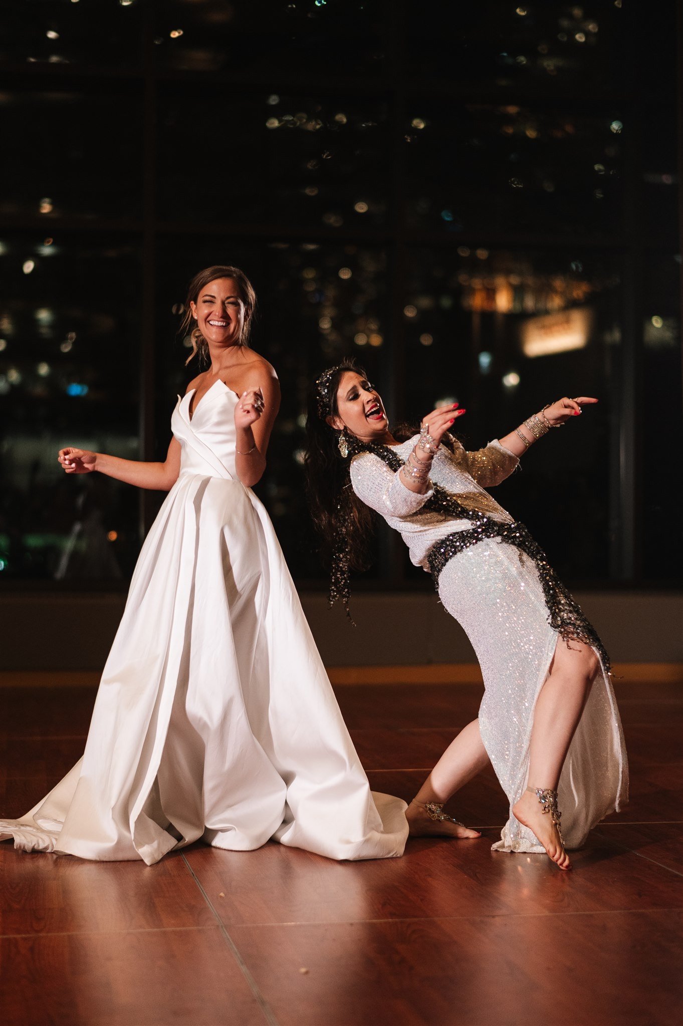 Safire Belly Dancers on a wedding belly dance performance with a beautiful bride.