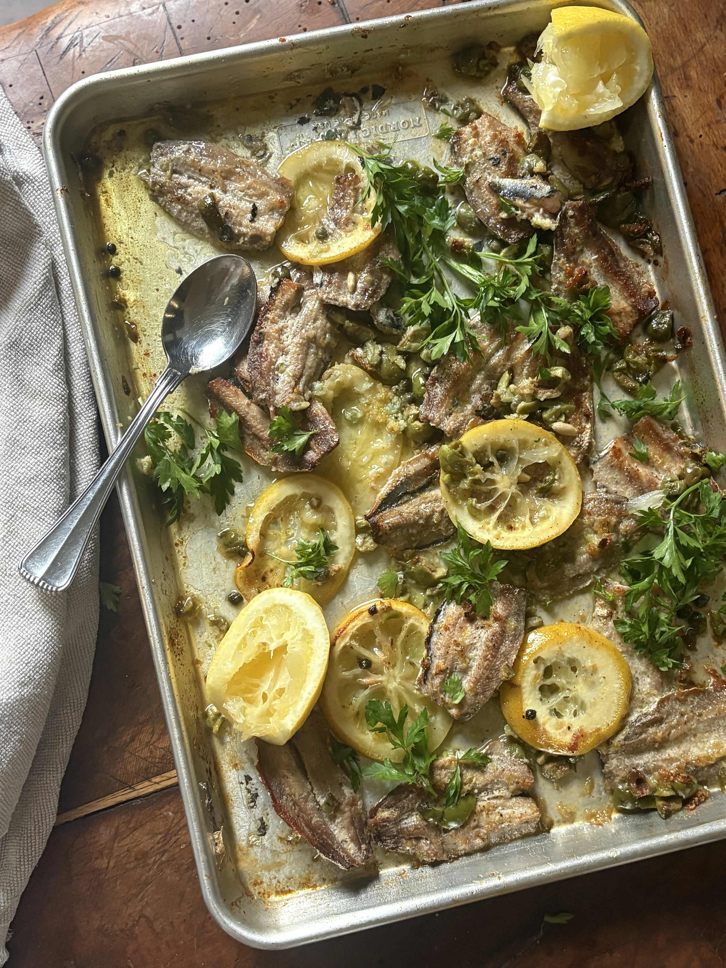 Baked sardines with lemon, capers &amp; olives