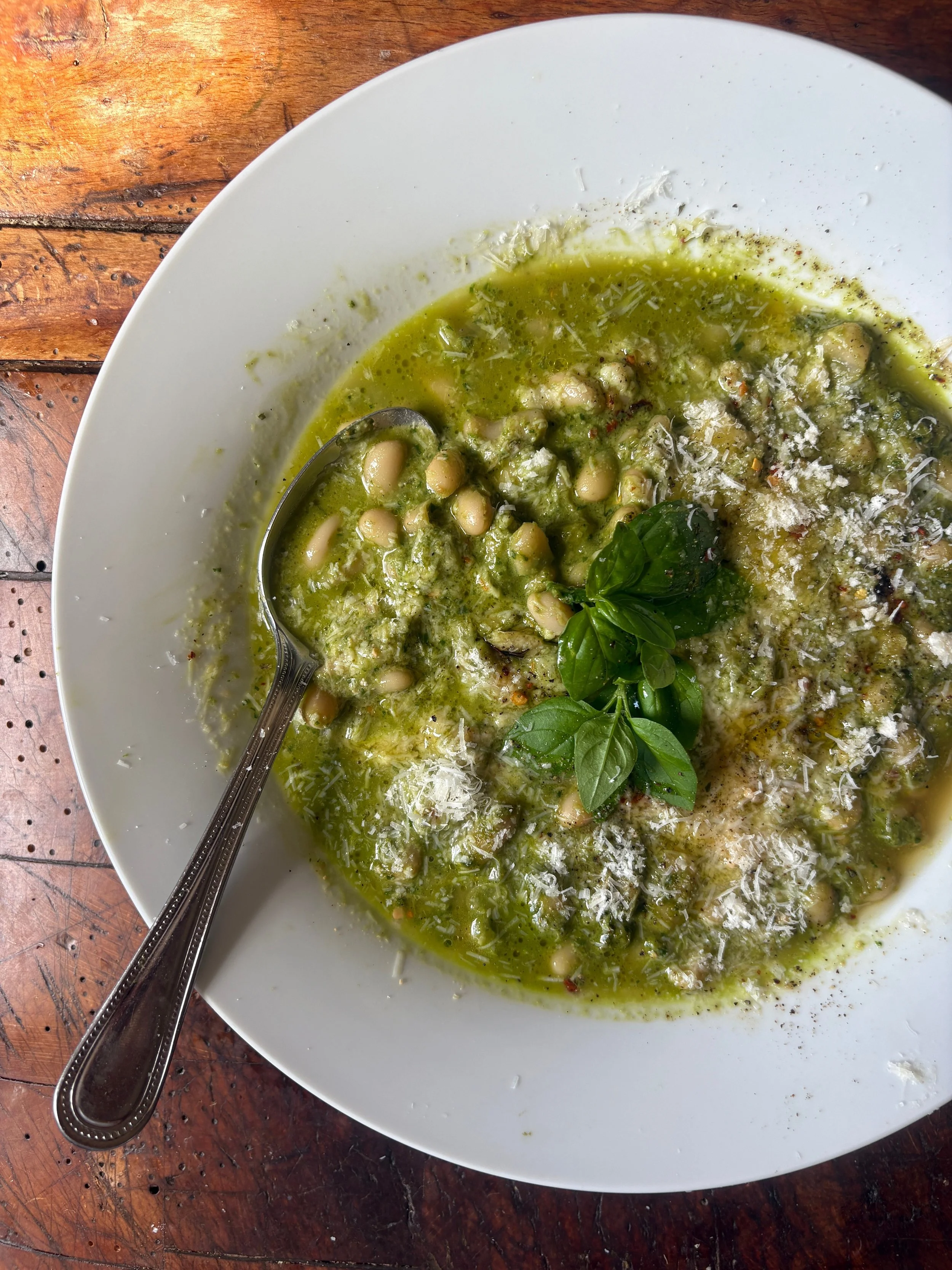 Pesto white beans in a miso broth