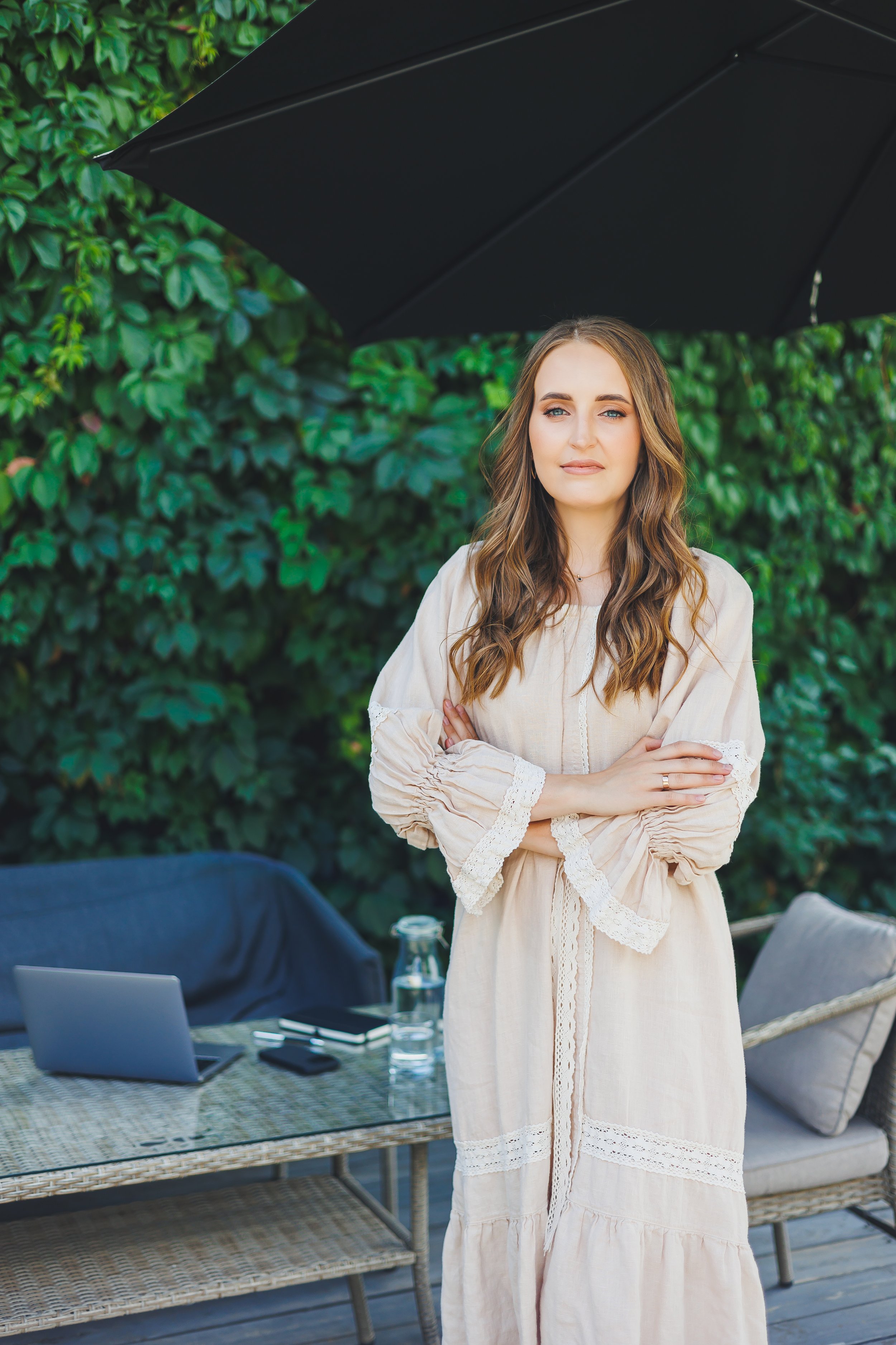 a-young-woman-in-a-dress-on-the-terrace-of-a-summe-2025-09-06-20-07-19-utc.jpg