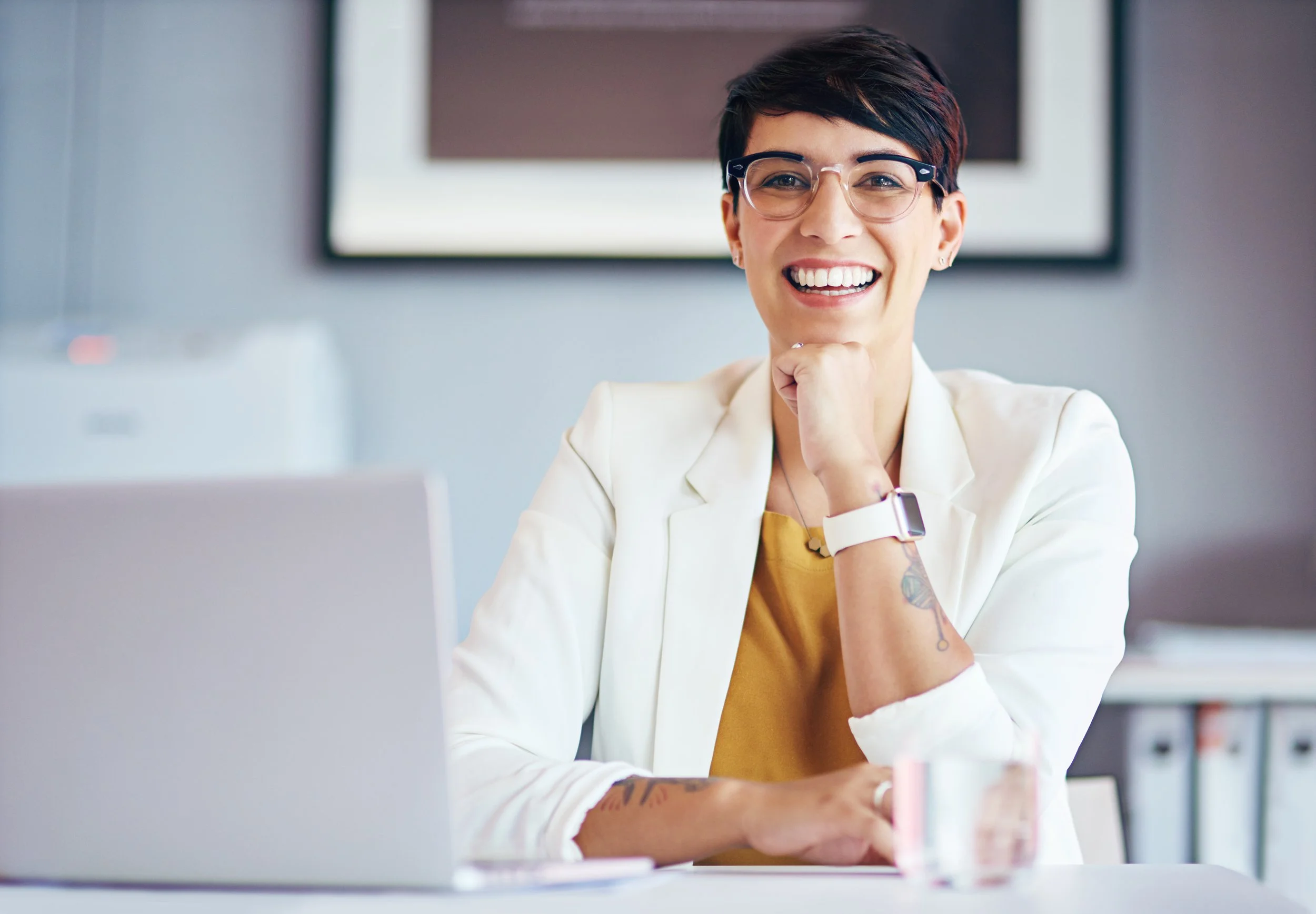 cropped-portrait-of-a-businesswoman-sitting-in-her-2025-04-06-02-26-19-utc.jpg