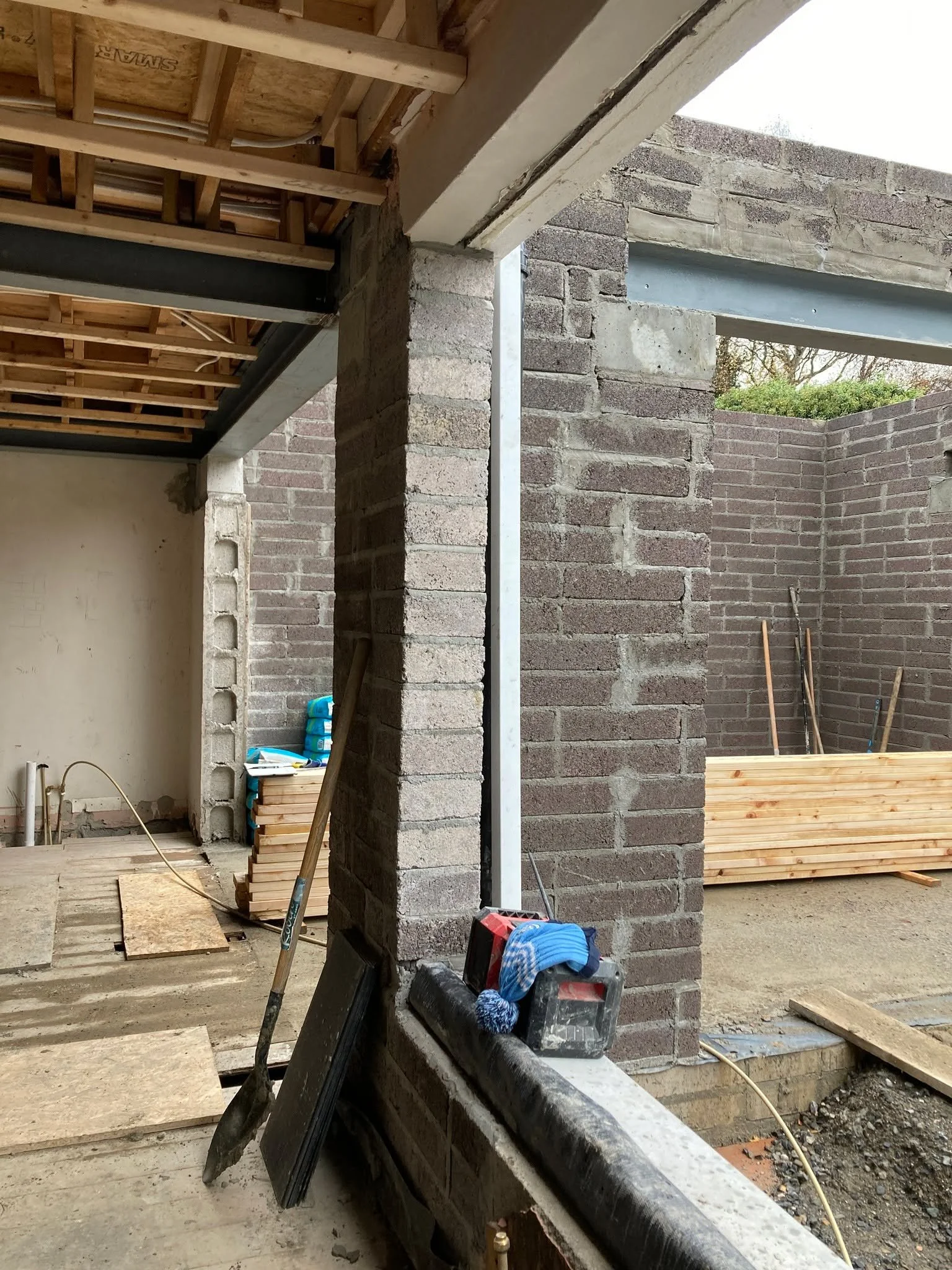 A little progress update from my Dalkey Project. These site photos are from earlier in the build, when the extension blockwork was complete and the garage conversion had just begun. 
The builder went to great lengths to source a brick that matched th