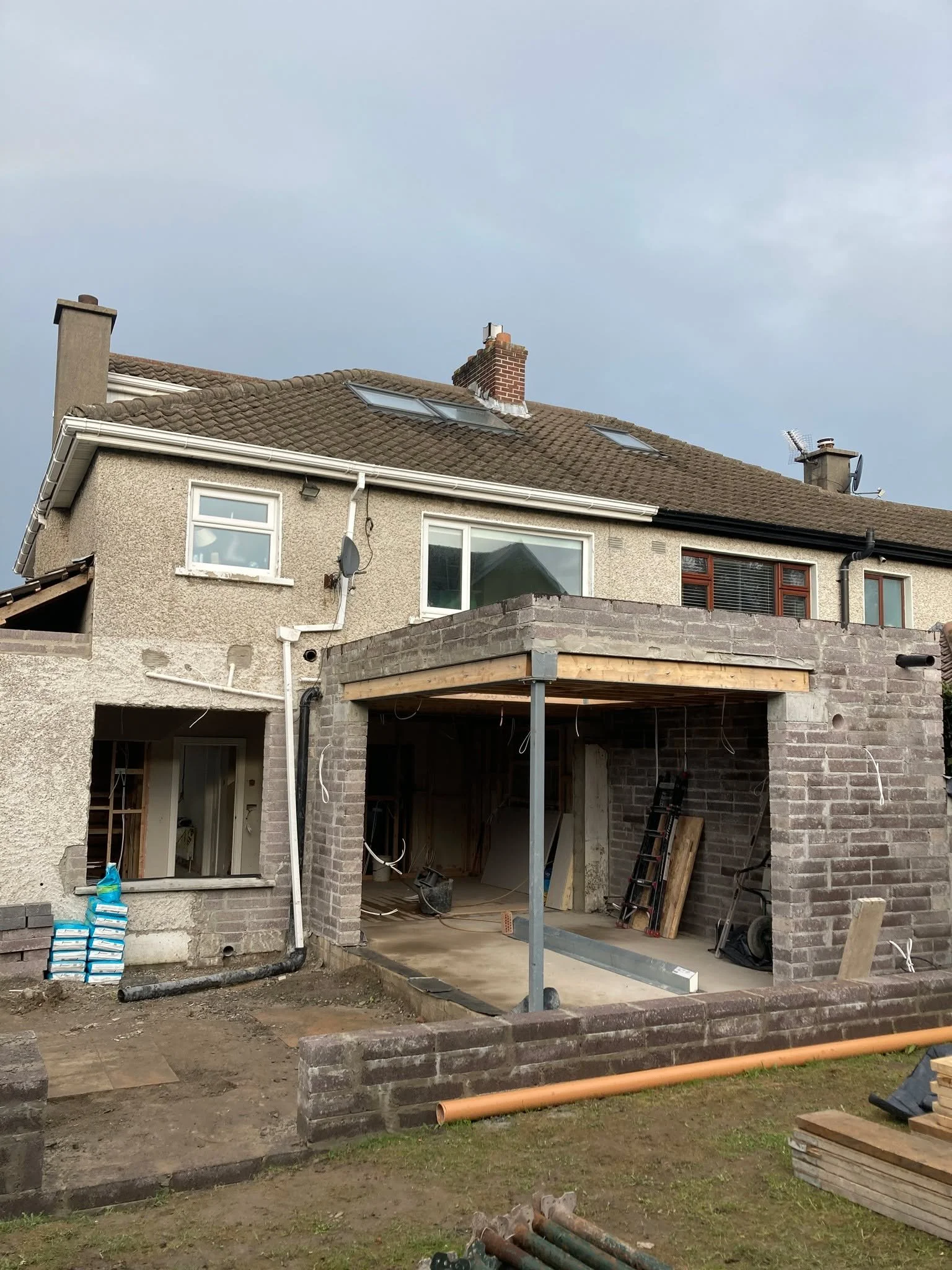 Catching up on progress from my Dalkey Project. 
These are some site photos from earlier in the build, when the extension blockwork was complete and the roof was just getting underway. It&rsquo;s always an exciting stage as the clients can really sta