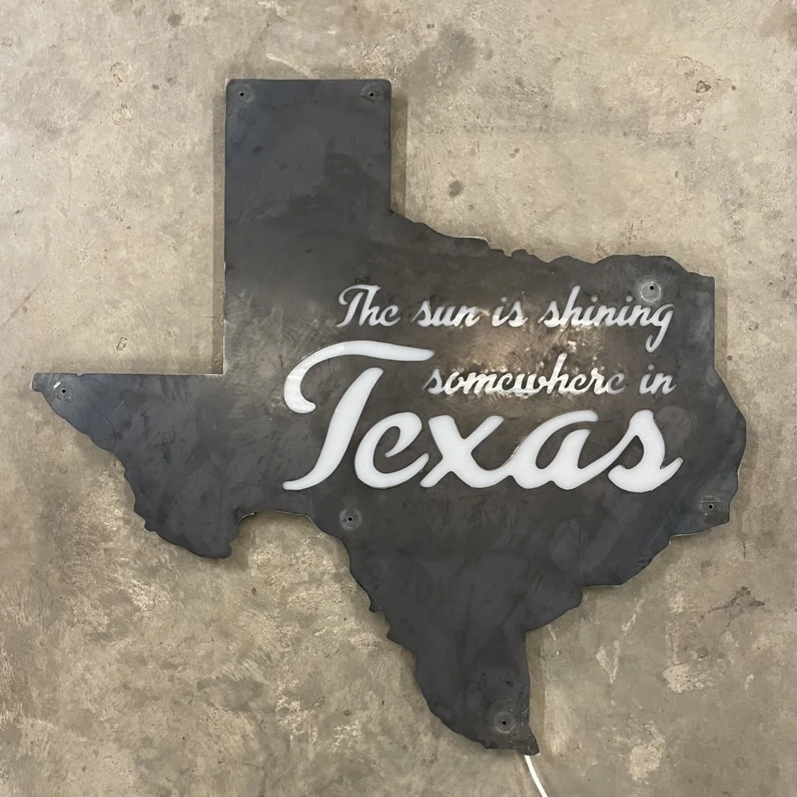 Backlit metal Texas sign with acrylic designed and created by Branded Metalworks