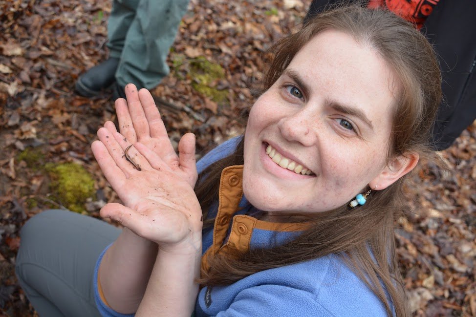 Huron Pines Land Protection Coordinator and salamander enthusiast Julia Butch holds a tiny red-backed salamander. 