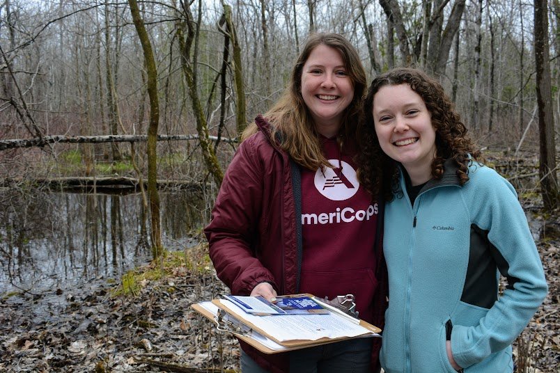  Huron Pines AmeriCorps members Taylor Shay (l) and Emily Kemp led an introduction to vernal pools, a type of seasonal forest wetland where wood frogs and other creatures congregate in spring. 