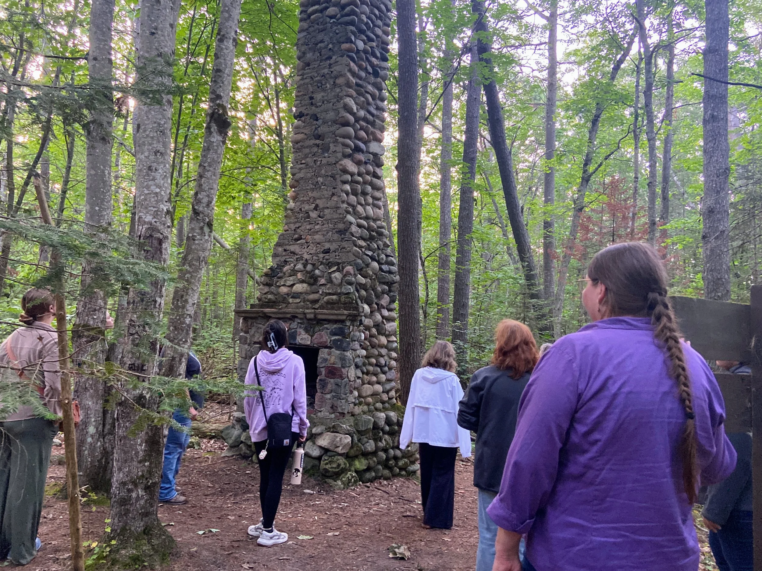  Participants explore the ruins of Bell, a former settlement which once stood at Besser Natural Area in Presque Isle County. 