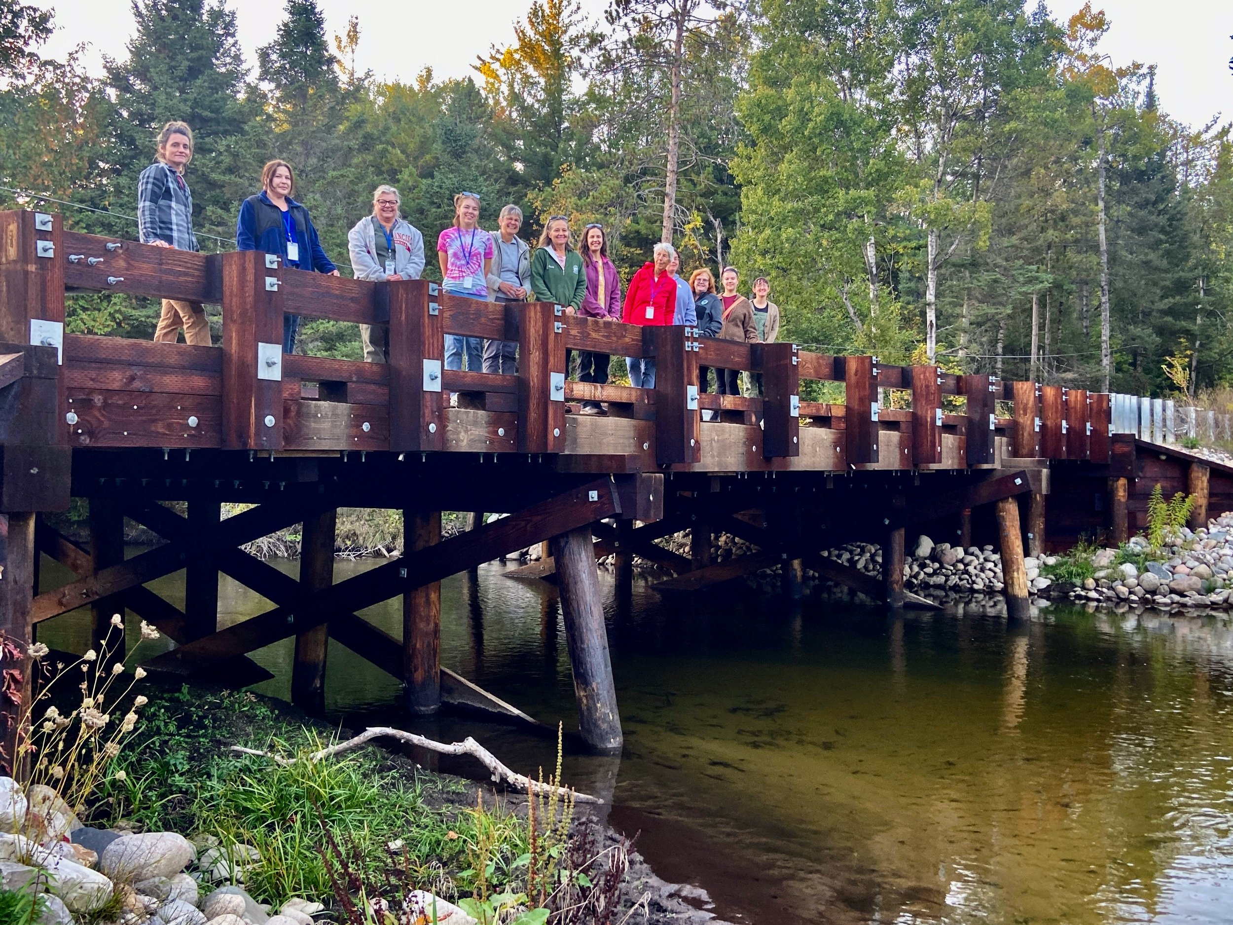  Conservation Stewards visited the restored crossing of the Thunder Bay River at Hall Road where Huron Pines built a new timber bridge to reconnect aquatic habitat. 