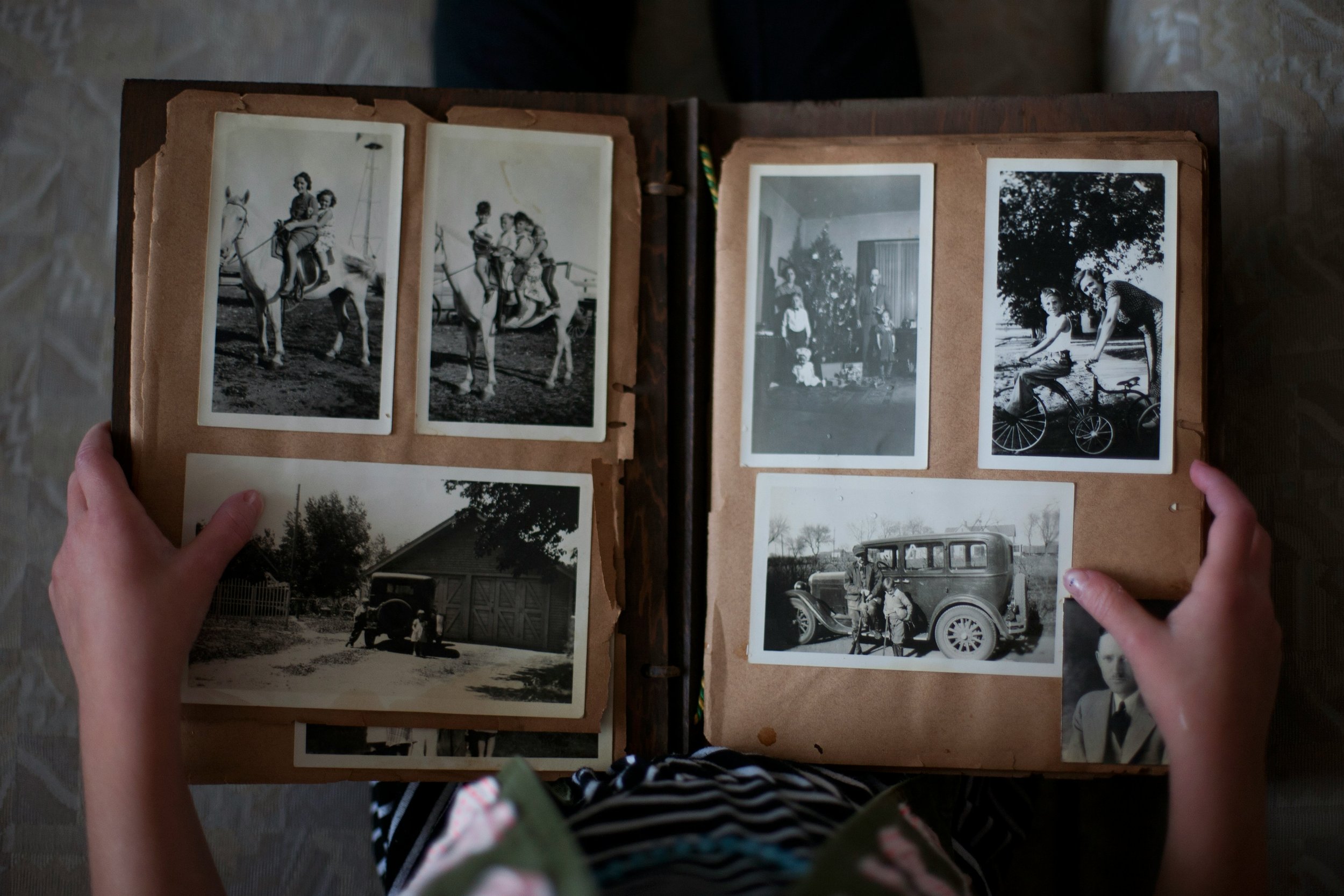 My Grandfather Shows Me His Photo Album, by Julie Ebin