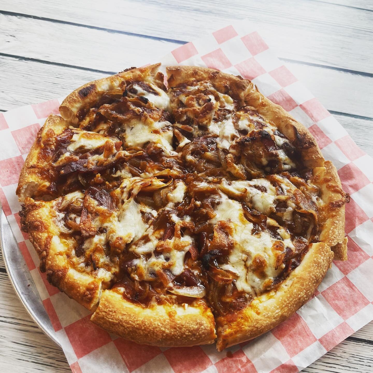 &ldquo;Alright alright alright!&rdquo; Come on down to Hercules and get your Dazed and Confused pizza! With barbecue sauce, chili, mozzarella, cheddar, onions, and bacon.