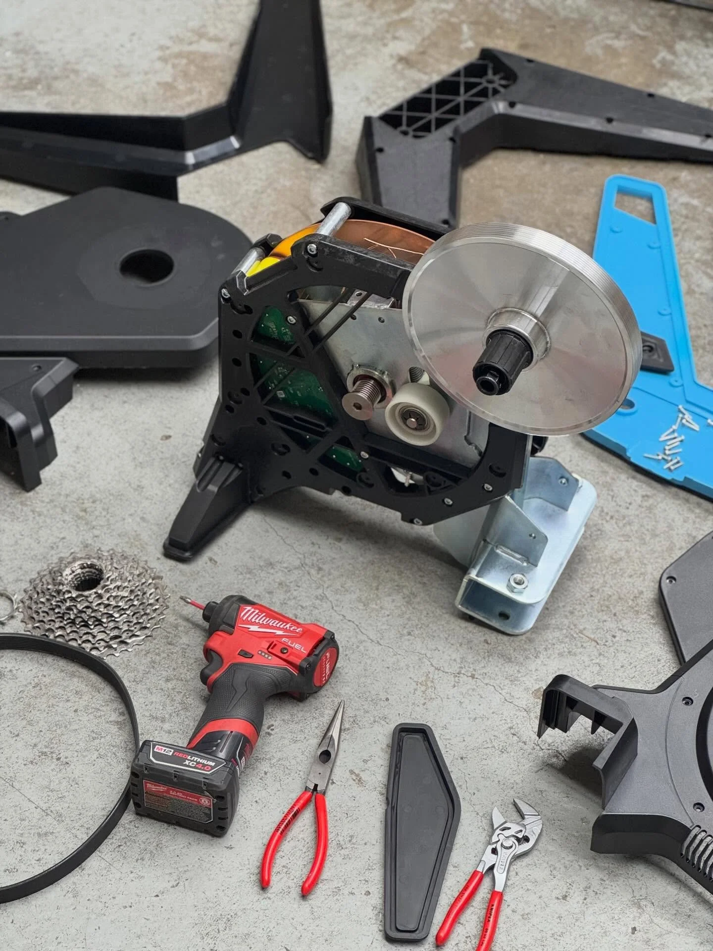 Smart Trainer Repair! This Tacx Flux 2 was making some pretty awful belt noise. After a full teardown (holy cow there's a lot of screws), it was pretty to disengage the belt tension sprint and swap out the belt. 

Yes, you can apply some belt dressin