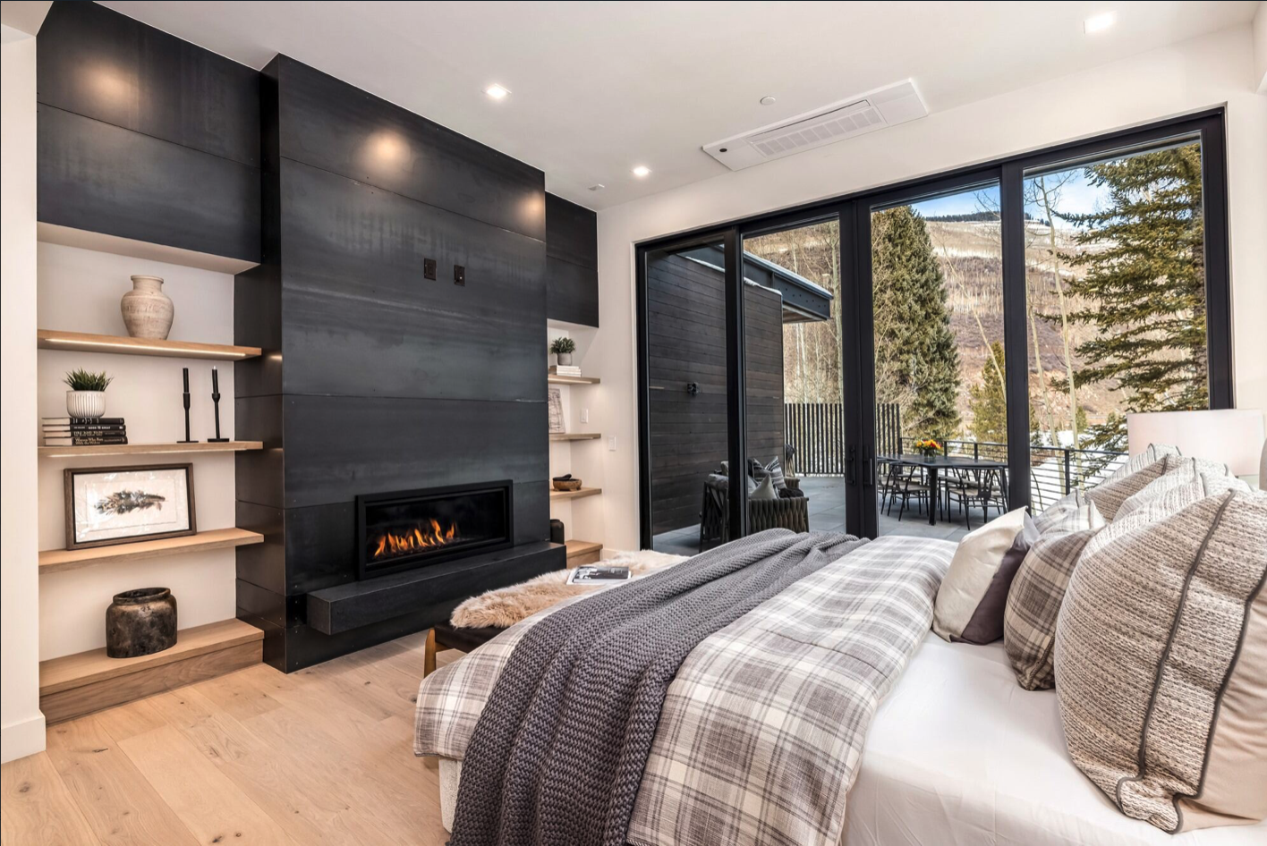 Sunburst Fairway Residence Primary Bedroom and Fireplace