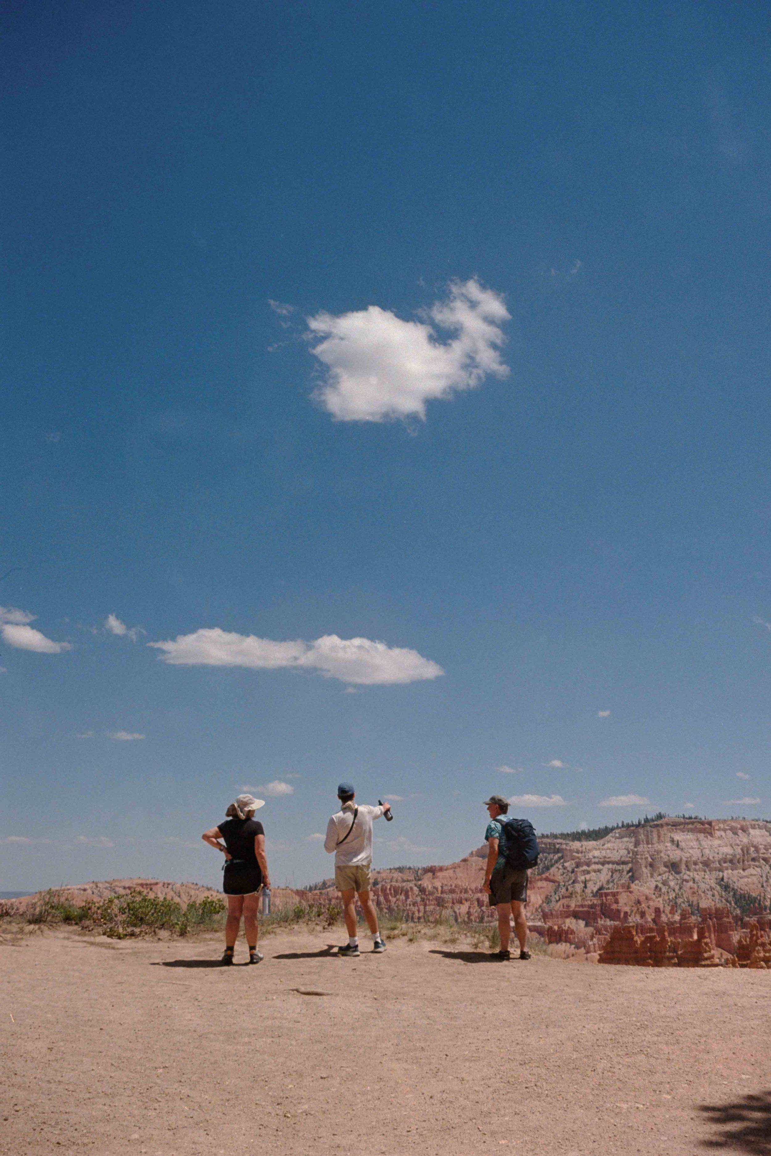 Vintage-style 35mm film photo of people overlooking Bryce Canyon in Utah