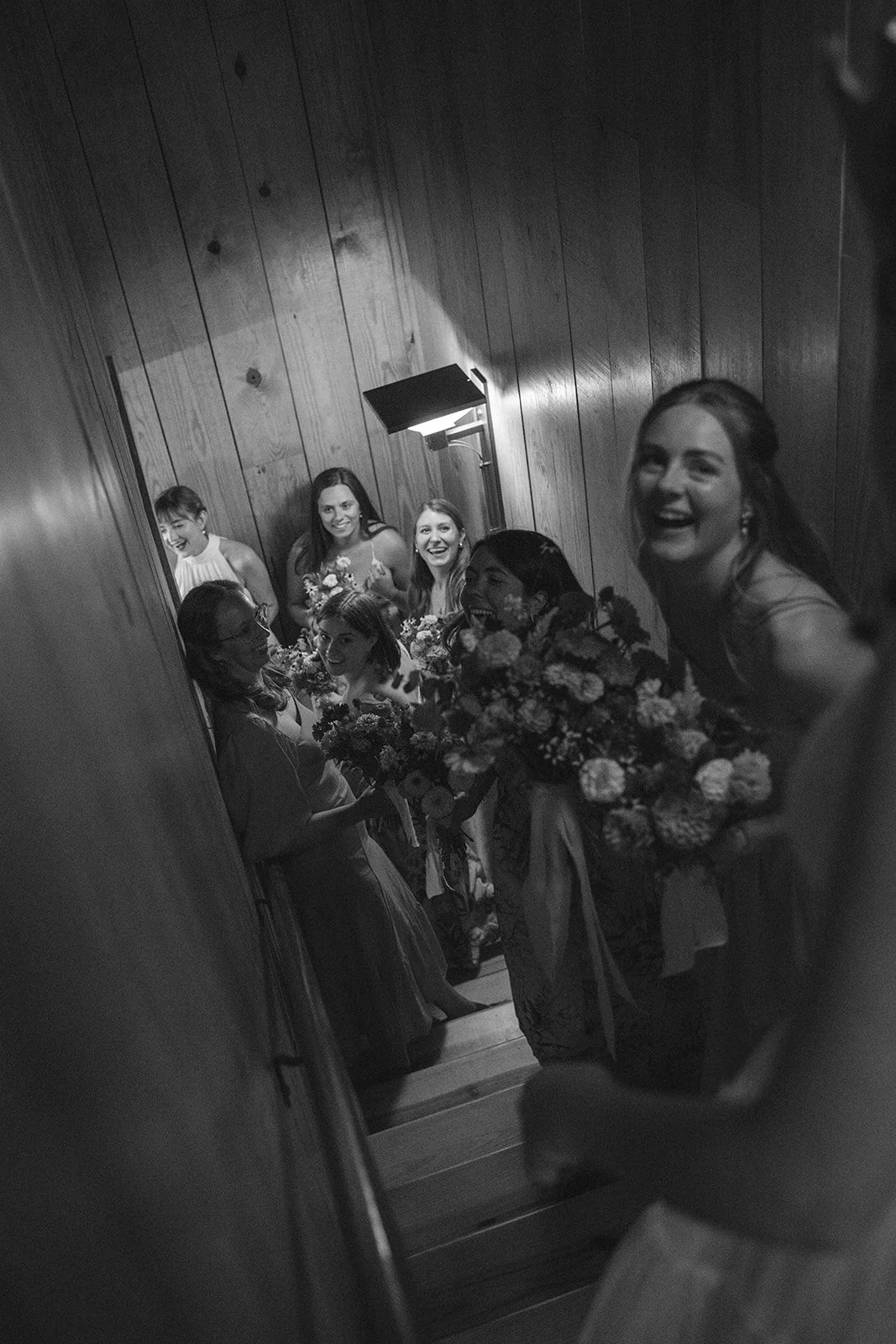 Documentary wedding photo of a candid moment with bridesmaids