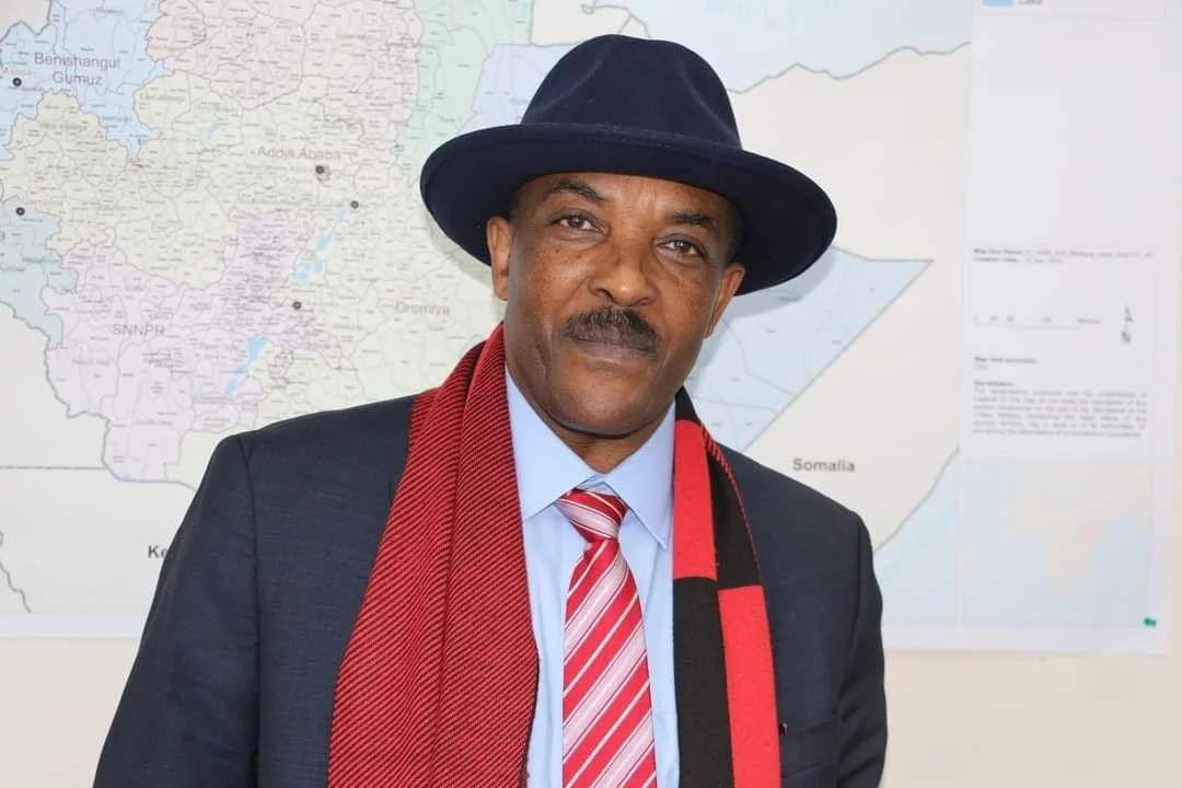 Behailu-in Blue hat.jpg