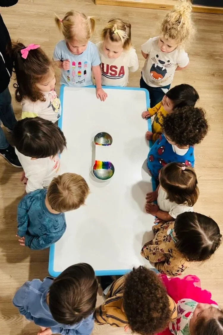 Children drawing in classroom at Chandlers Preschool in Highland Park, Ca. 