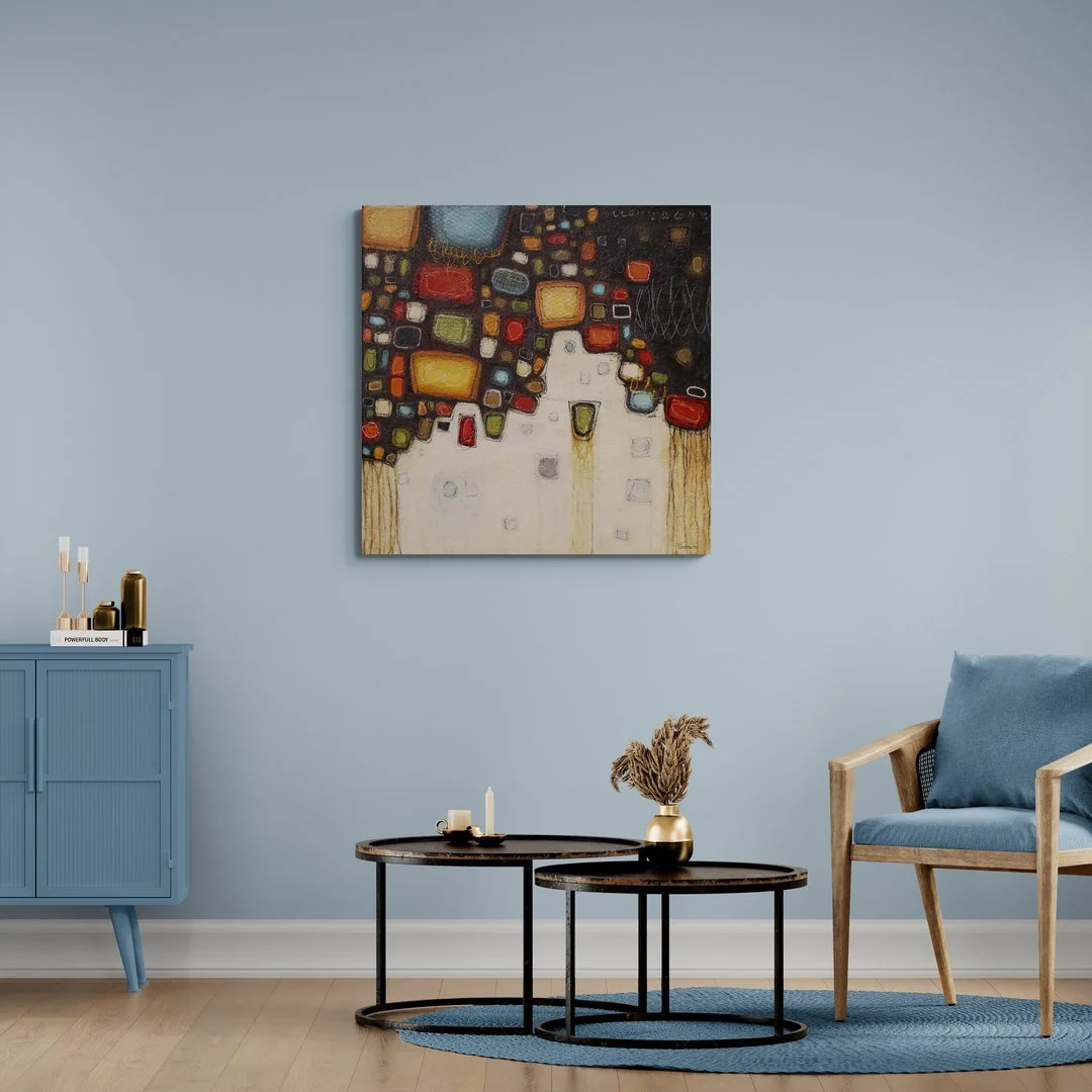 living-area-with-a-chair-and-round-tables.jpg