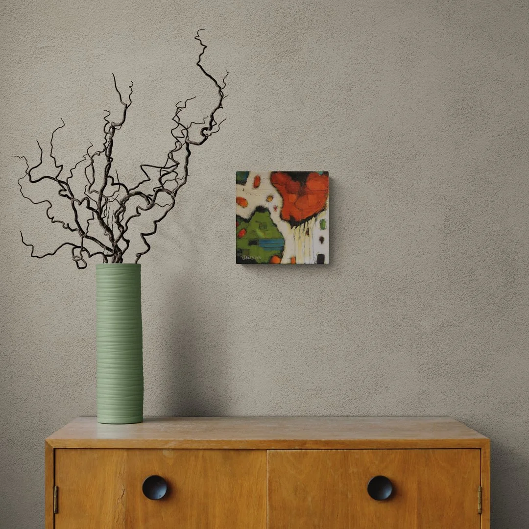 map 2 curly-twigs-in-vase-sitting-on-cabinet.jpg