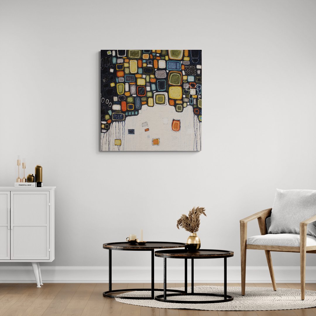 living-area-with-a-chair-and-round-tables.jpg