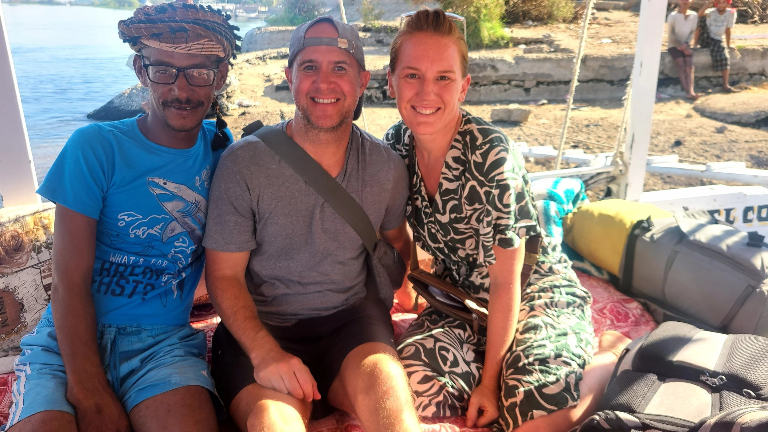 A man and an woman with local guide on the Nile River