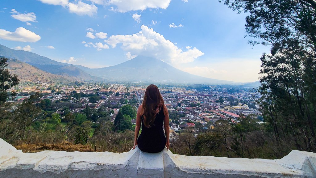 Woman on top of hill of the cross in Antigua Guatemala
