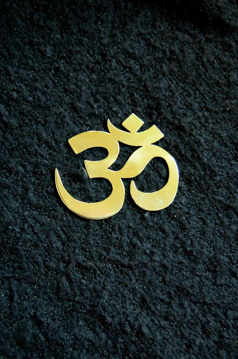 simbolo-aum-2.jpg