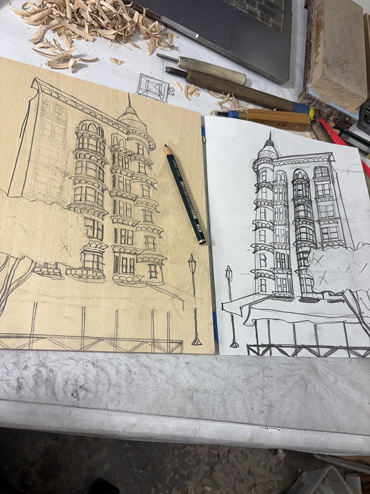 Contemporary printmaker teaching woodcut printmaking techniques