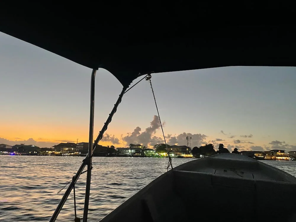 Water taxi during sunset from Carenero Island to Colon island during the Experience Surf Camp at bocas del toro Panama
