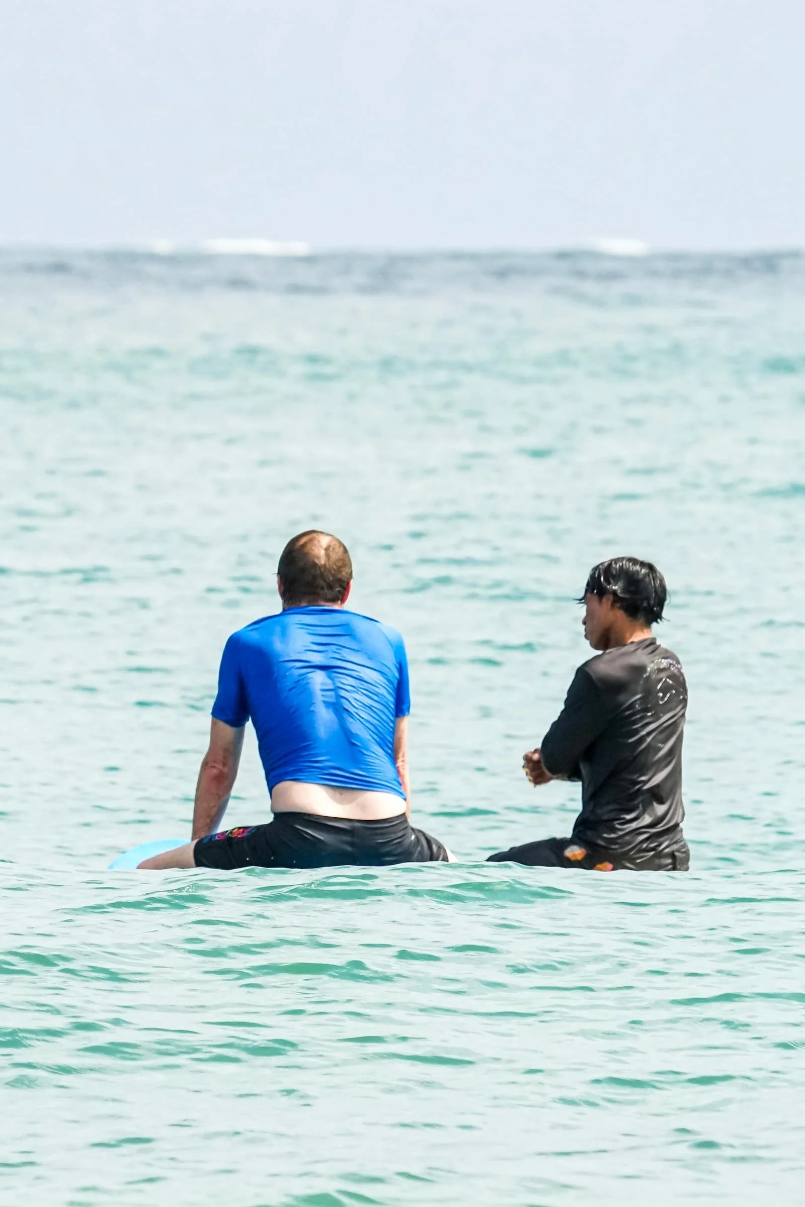 Surf instructor giving a surf lesson at The Experience Surf Camp at Bocas del Toro Panama