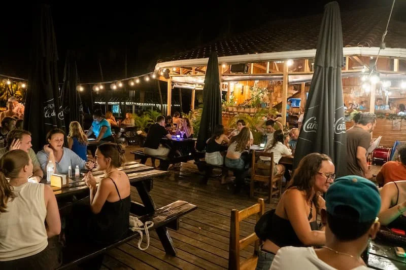 People having dinner with The Experience Surf Camp at Bocas del Toro