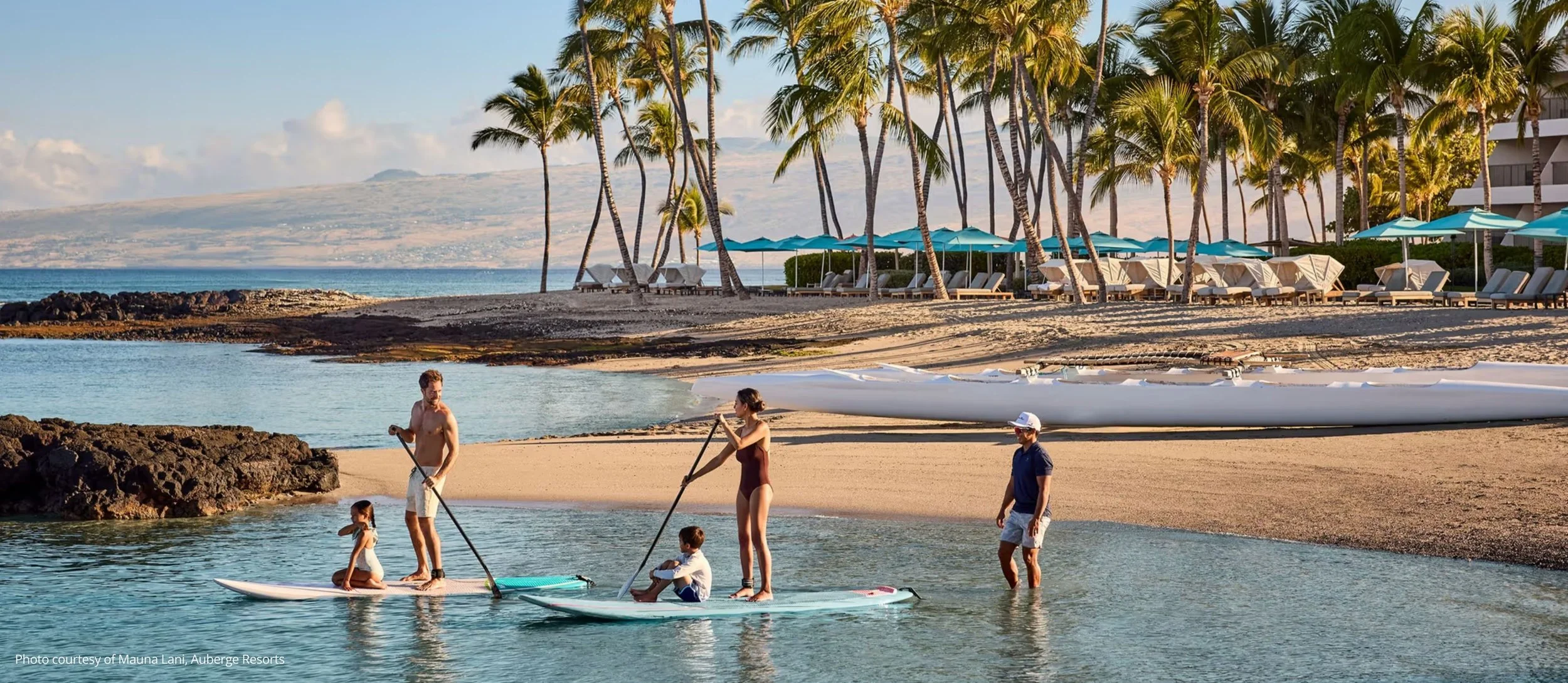 Family surfing at Mauna Lani Auberge