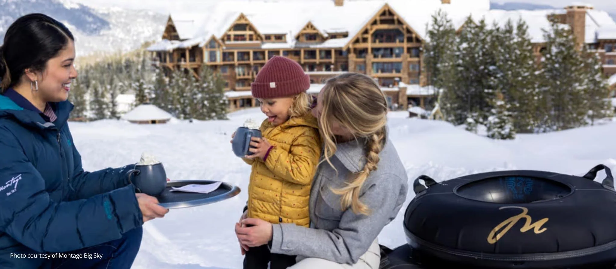 multigenerational family travel enjoying hot chocolates at Montage Big Sky in Montana