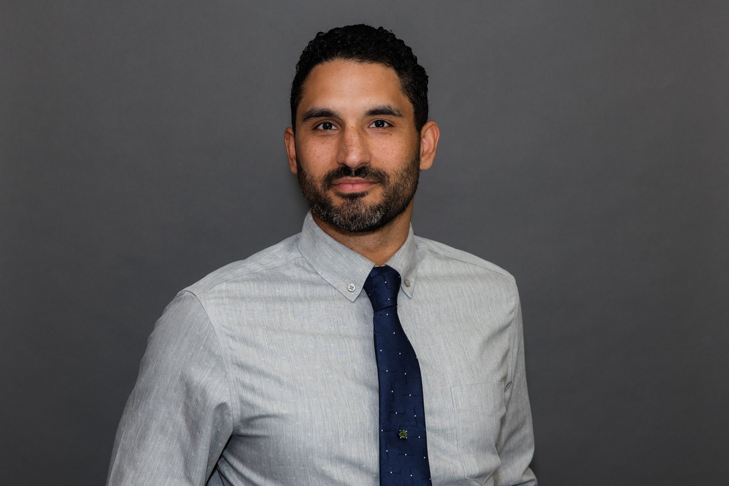 man shirt and tie headshot.jpg