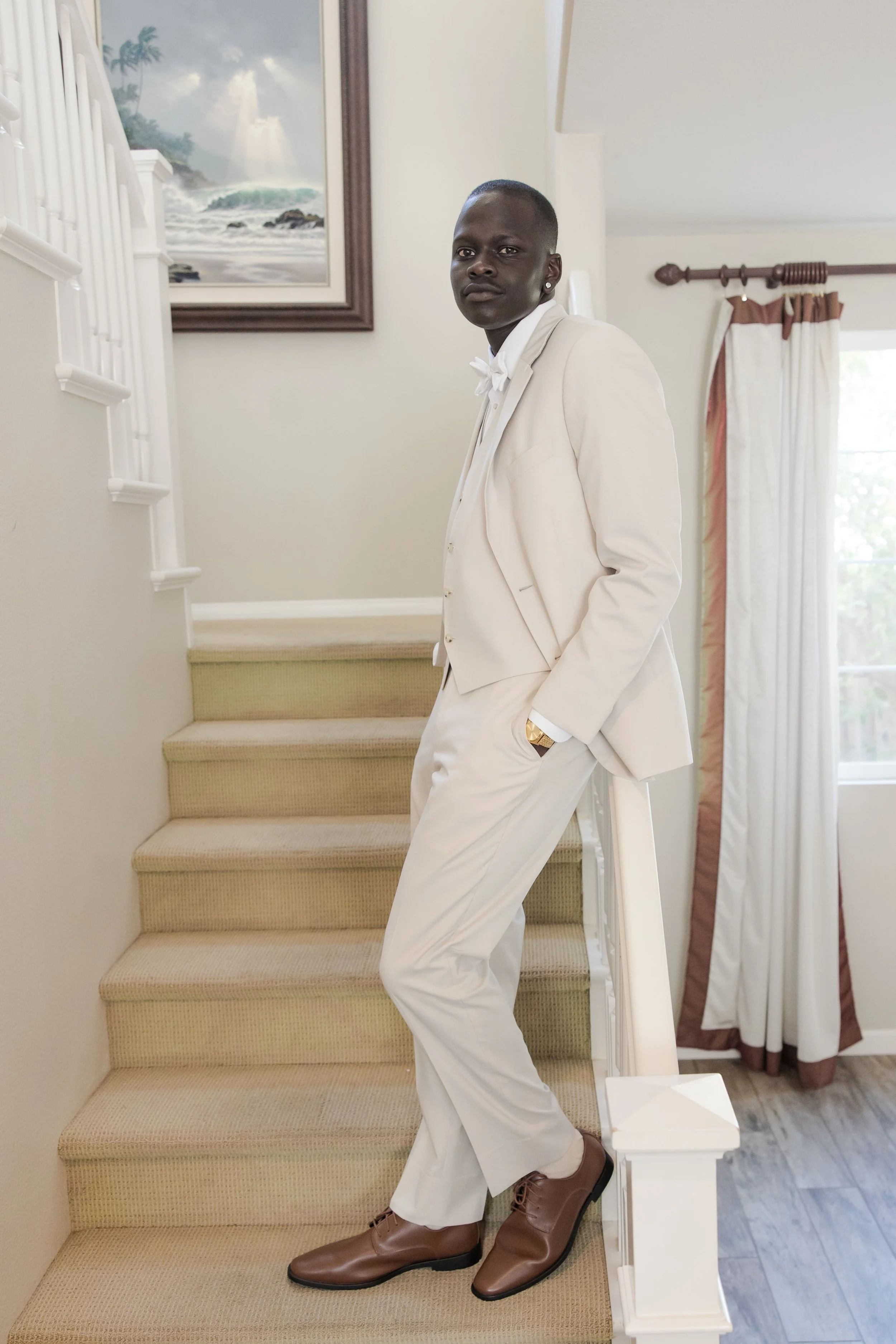 groom-stairs-wedding.jpeg